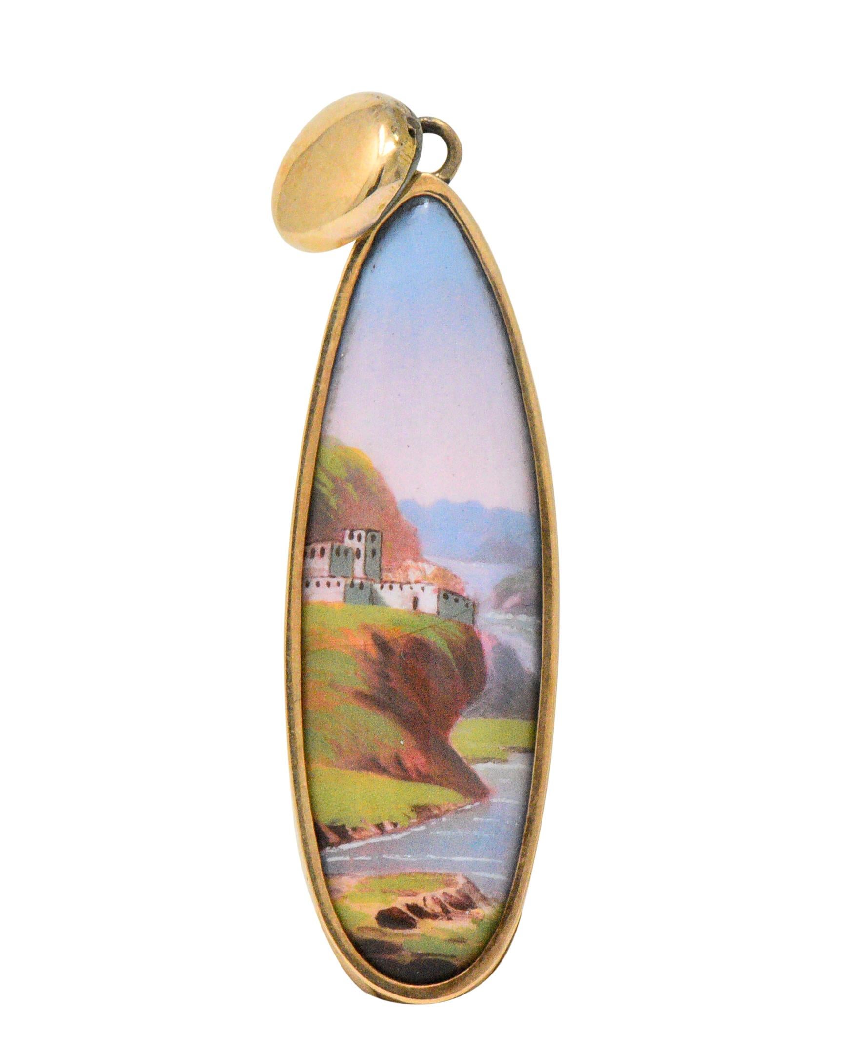 Featuring an oblong drop that contains a hand painted Swiss enamel porcelain plaque 

One depicting a house in the background and the other a landscape with flowing water

Beautifully painted

Polished gold surrounds and round gold