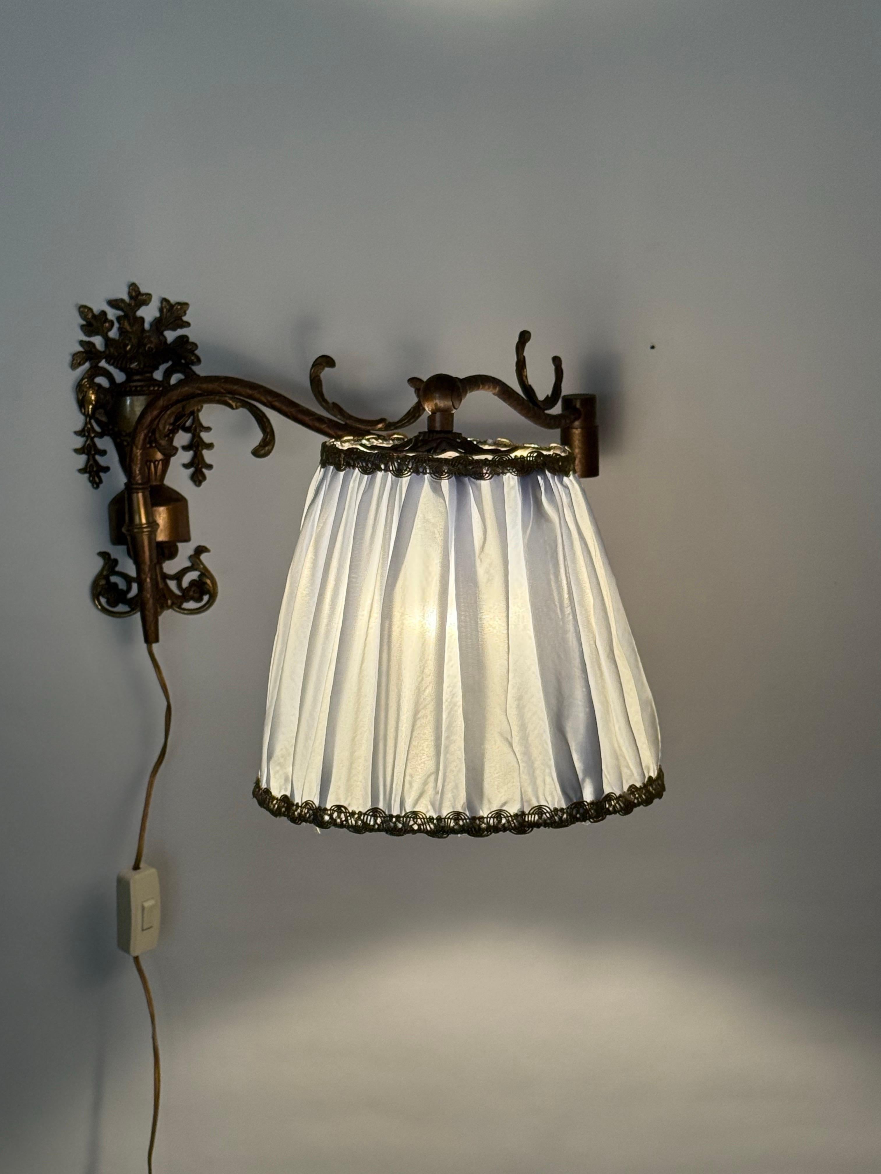 Cast Victorian Swivel Wall Lamp Gilded with Ram's Head and Urn France Around 1880 For Sale