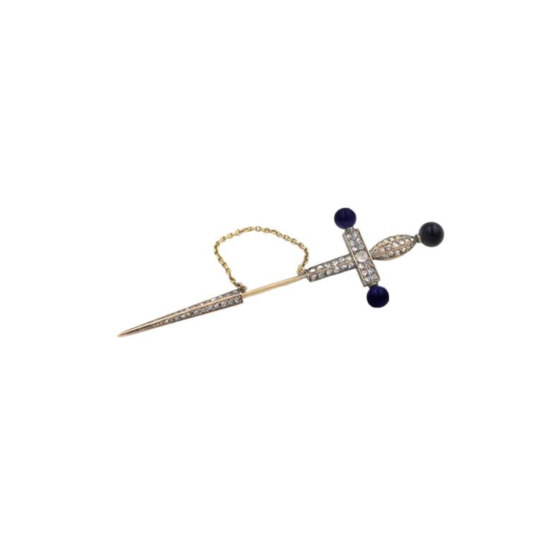 Victorain Sword style Jabot brooch in Silver topped 14k yellow gold, set with rose cut diamonds and lapis, circa 1900.  The sword has a pendant attachment that has been added so it can be worn on a chain also.  Super chic.  3.5 inches long.
