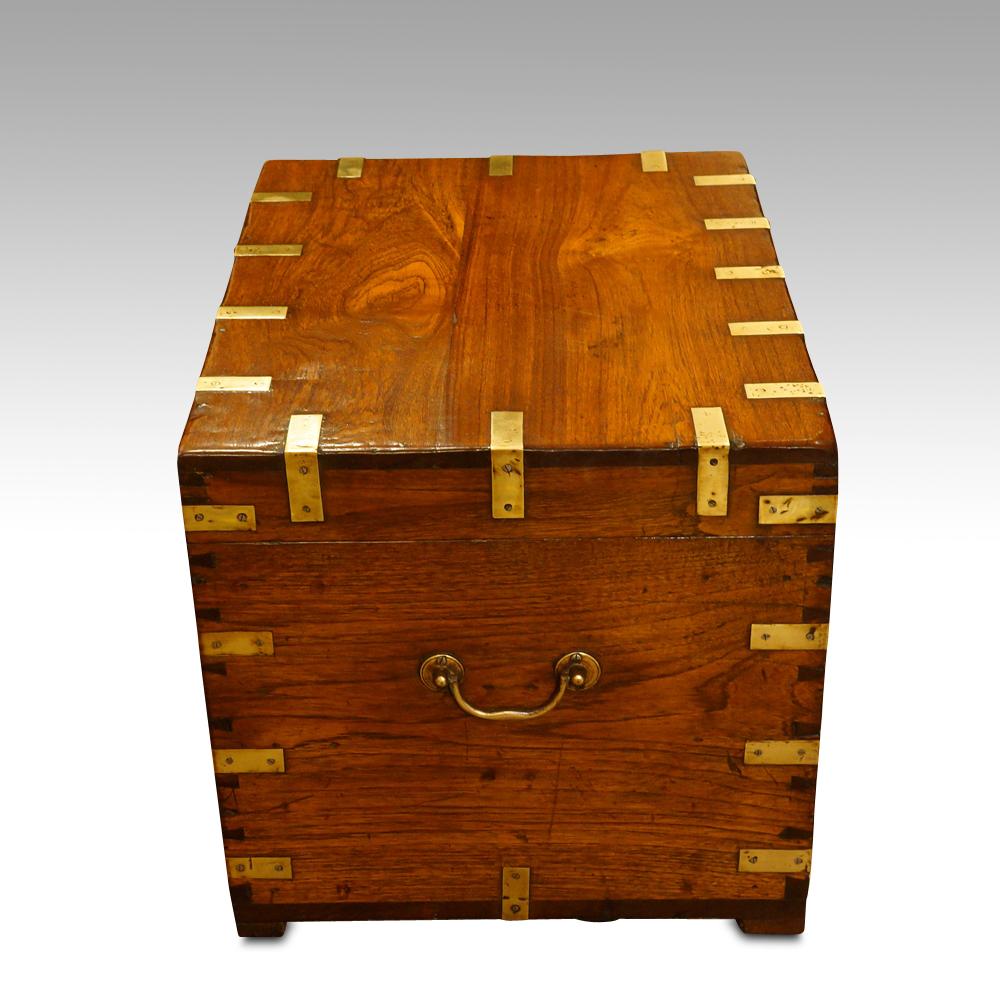 Victorian teak military chest 
This Victorian teak Campaign chest was made circa 1870. 
Here we have this Victorian trunk that would have been used by a British officer to transport his uniforms and valuables around the Empire.
This chest is made of