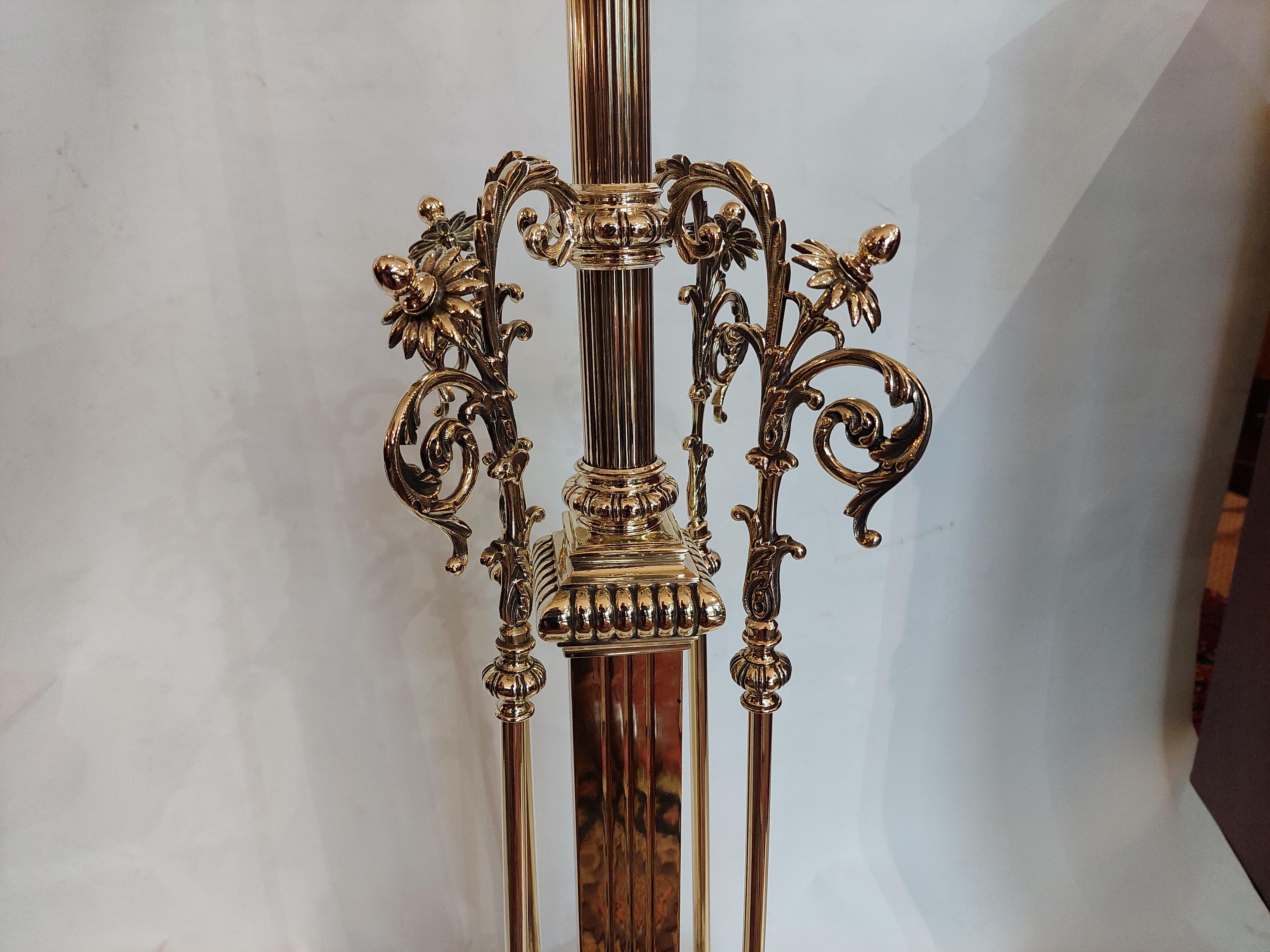 Victorian telescopic brass standard lamp modelled as an embellished classical column with foliate moulding and further foliate embellishments, resting on eagle claw feet - 22