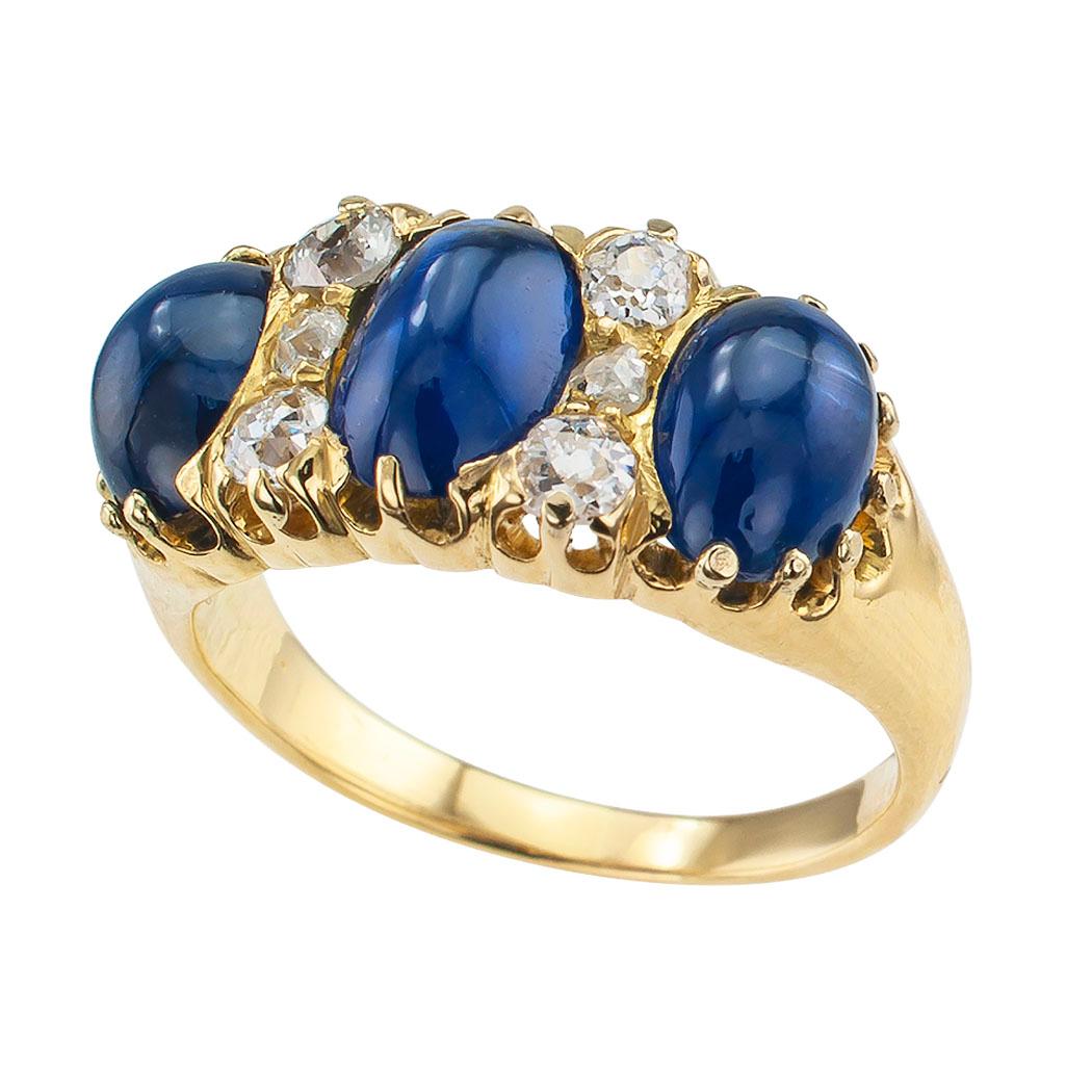 Victorian three-stone cabochon sapphire diamond and gold ring circa 1900.
DETAILS:
Lady’s Victorian cabochon blue sapphire diamond and gold ring.
Three oval cabochon sapphires together weighing approximately 3.50 carats.
Six round old-cut diamonds