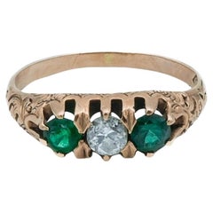 Victorian Three Stone Emerald and Diamond 10 Karat Rose Gold Antique Ring