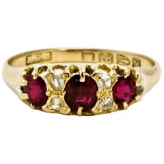 Antique Victorian Three-Stone Ruby and Diamond 18 Carat Yellow Gold Ring