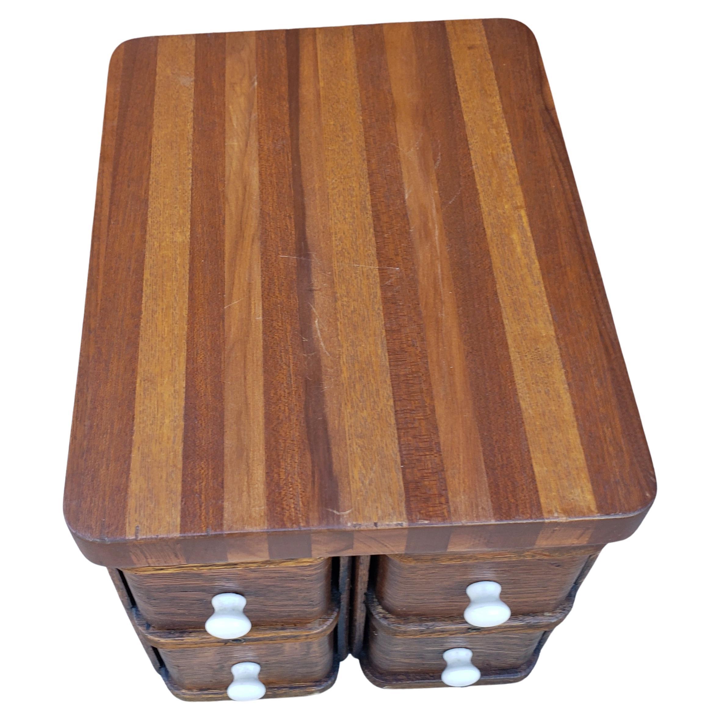 A rare, exquisite Victorian Sewing drawers or desktop filing cabinet in oak parquetry and tiger oak. 
Porcelain drawer knobs. 
May be used as riser for lamp or any other piece that is in need of visibility in a decor. Very good vintage