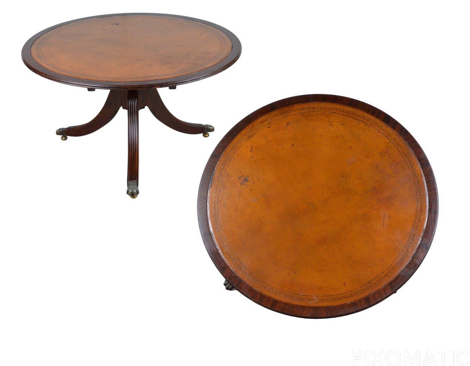 We are delighted to offer for sale this lovely mahogany occasional table, with round table top and faded tan leather, inset with a gold-tooled edge, on a turned column with reeded legs and lion brass cup casters.

Overall the table is in good
