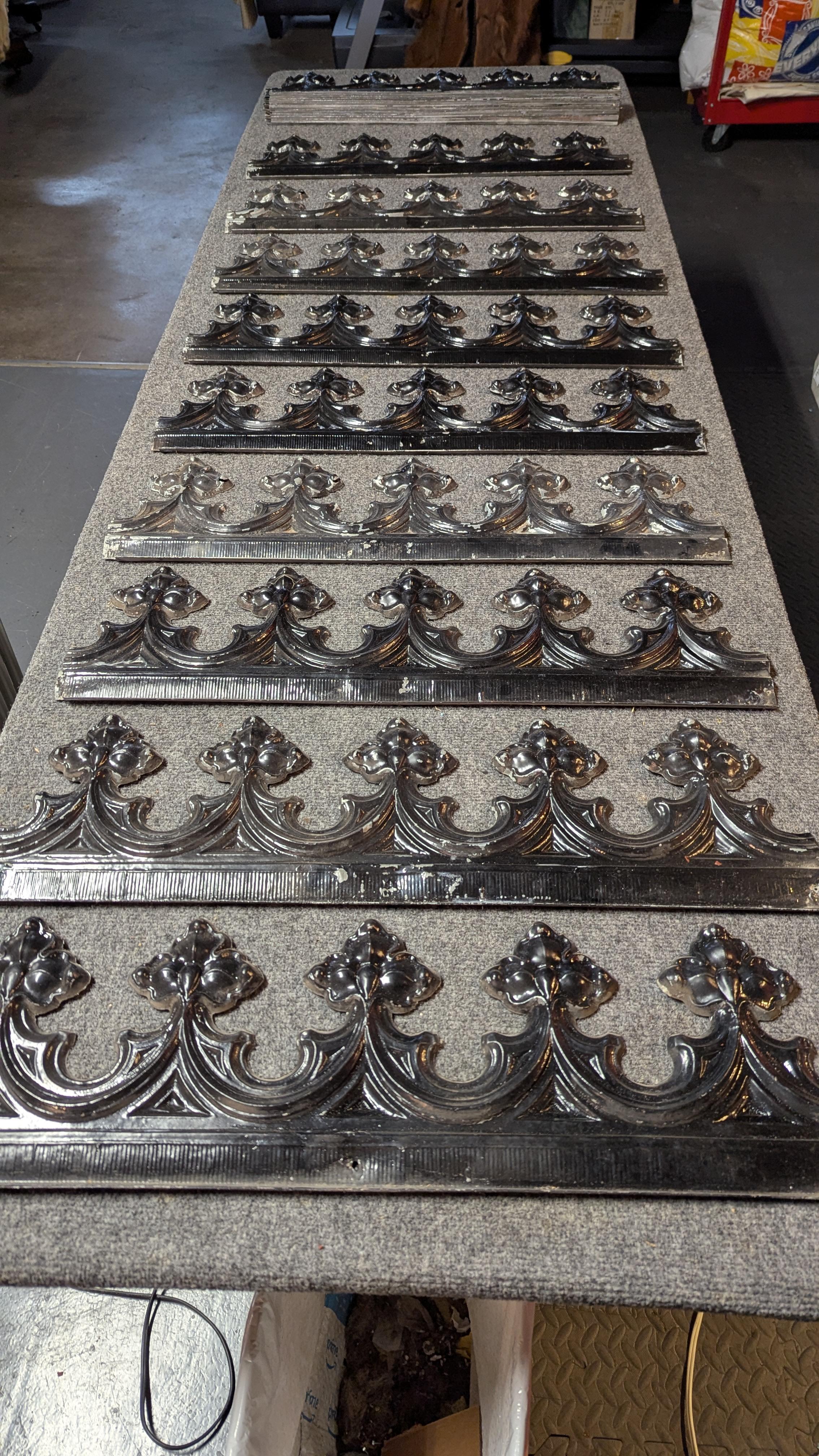 Here available are 25 pieces of original Victorian pressed tin ceiling cornice pieces.  Each section is 8