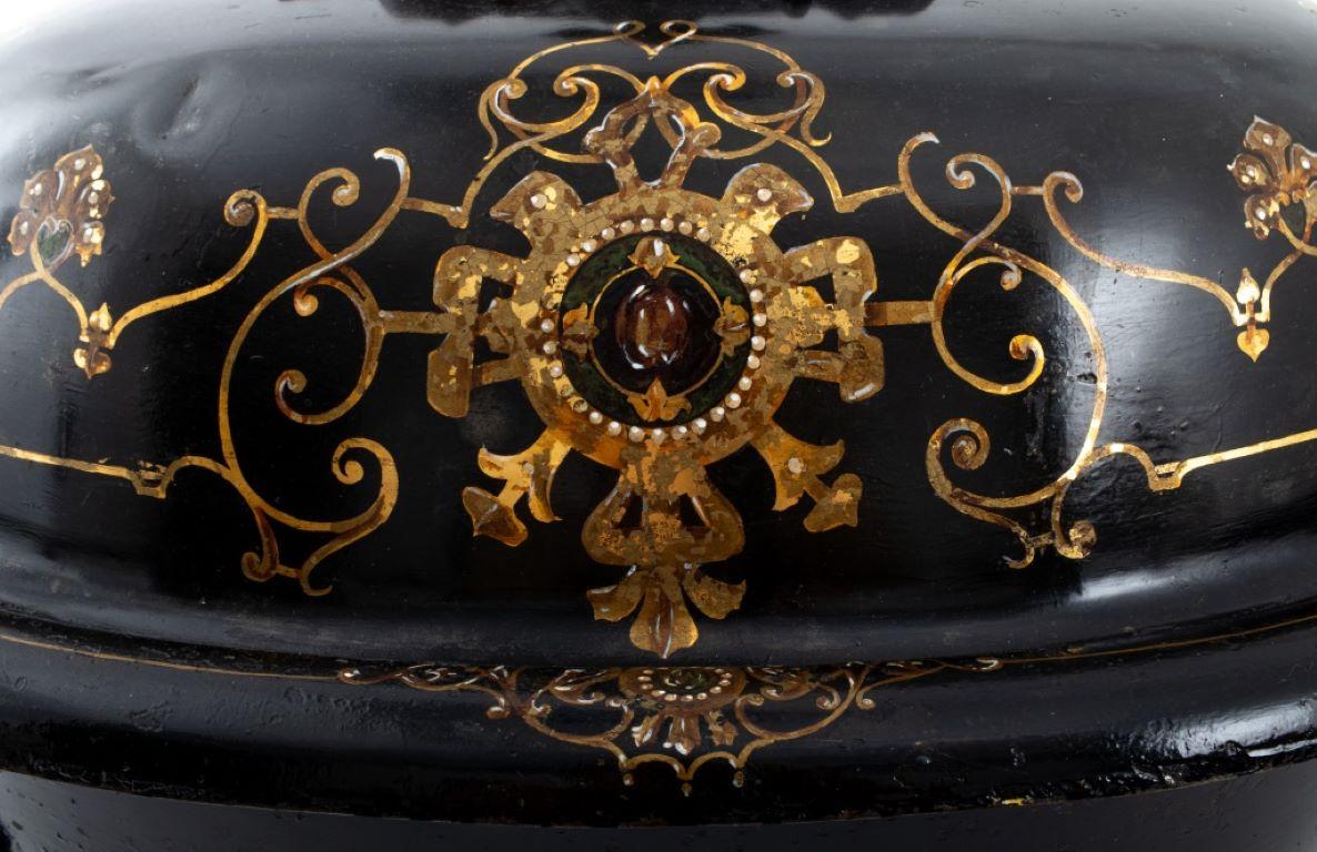 Victorian Tole Peinte and Cast Iron Coal Scuttle, in the Renaissance Revival taste. Provenance: From a 146 West 57th Street collection. 

Dealer: S138XX