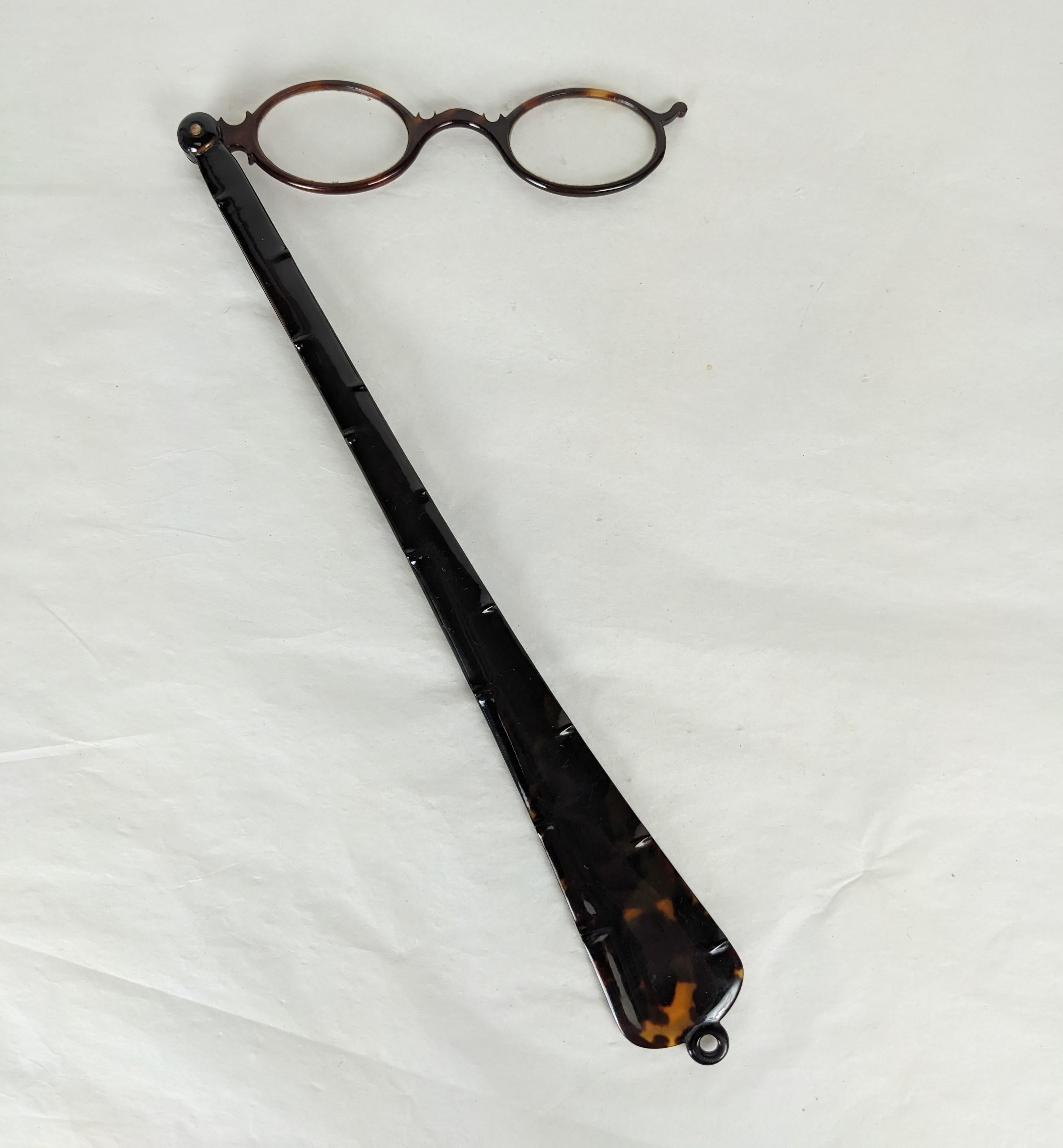 Victorian Tortoiseshell Lorgnette from the 19th Century. Delicately hand carved tapered shaft with dimpled edges for decoration and a better grip. 1870's European. 9.5