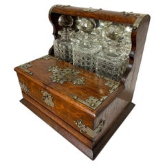 Victorian Triple Decanter Oak Tantalus with Silver Plated Strapwork Ca. 1880s