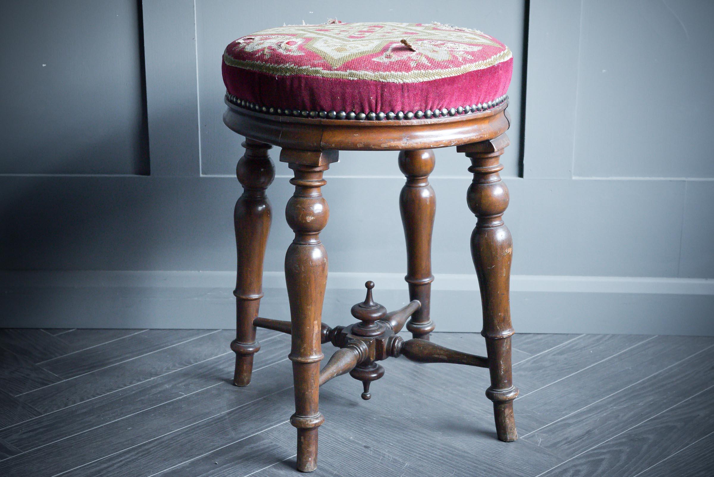 Victorian Turn Stool made from solid wood with red embroided seat pad by W.Williamson of Guildford.