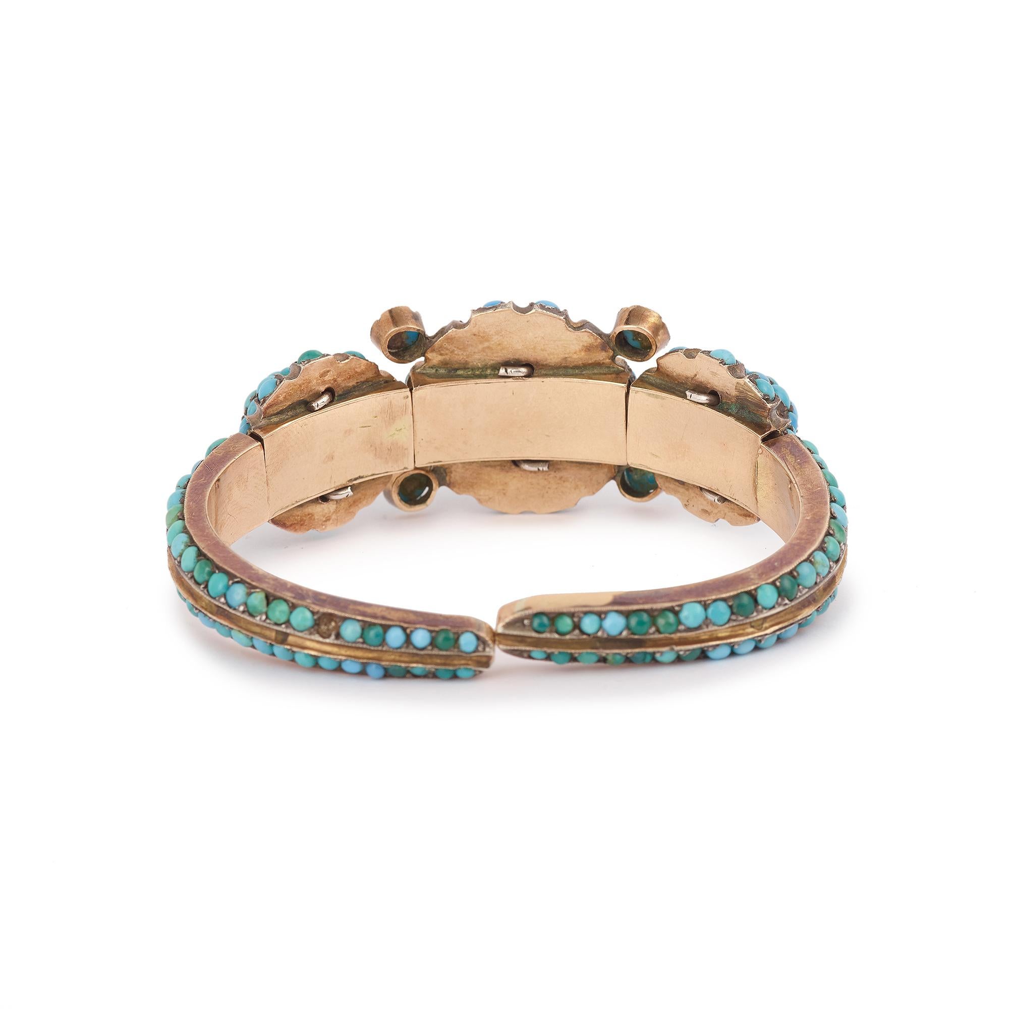 Victorian gold-plated bracelet set with a multitude of cabochon turquoise stones.

2 very small turquoises are missing on the back of the bracelet

Dimensions bracelet : 2.4 x 5.5 x 1.41 cm, (0.941 x 2.171 x 0.555 inch)

Weight bracelet: 63 g

Wrist