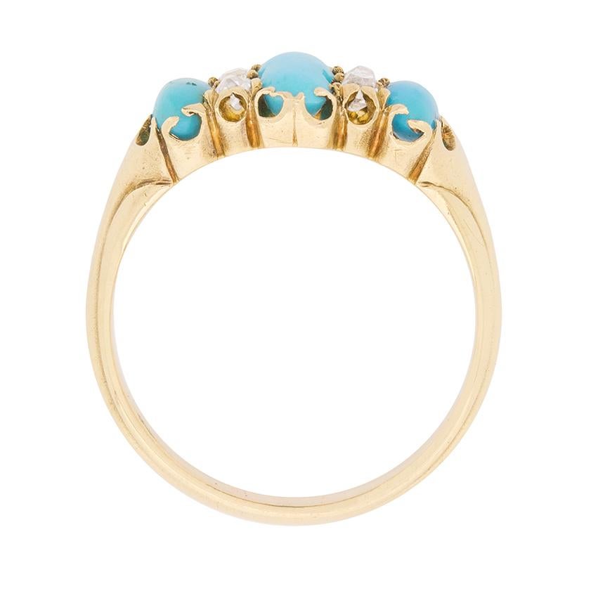 This delicate ring dates back to the 1880s and is full of character. It features three had cut, cabochon cut turquise gemstones. They are all natural with a wonderful light teal colour. They are oval shaped and have a combined weight of 1.00 carat,