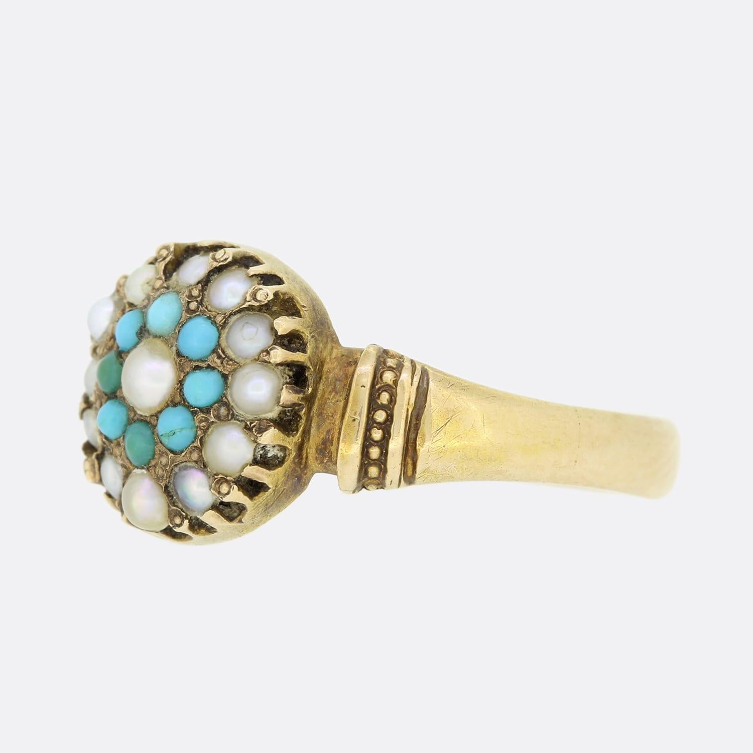 This is a 15ct yellow gold turquoise and pearl cluster ring from the mid Victorian era. Turquoise and pearls were often used together in Victorian jewellery as the vibrant blue works well with the white lustre. Inside the back of the head of the