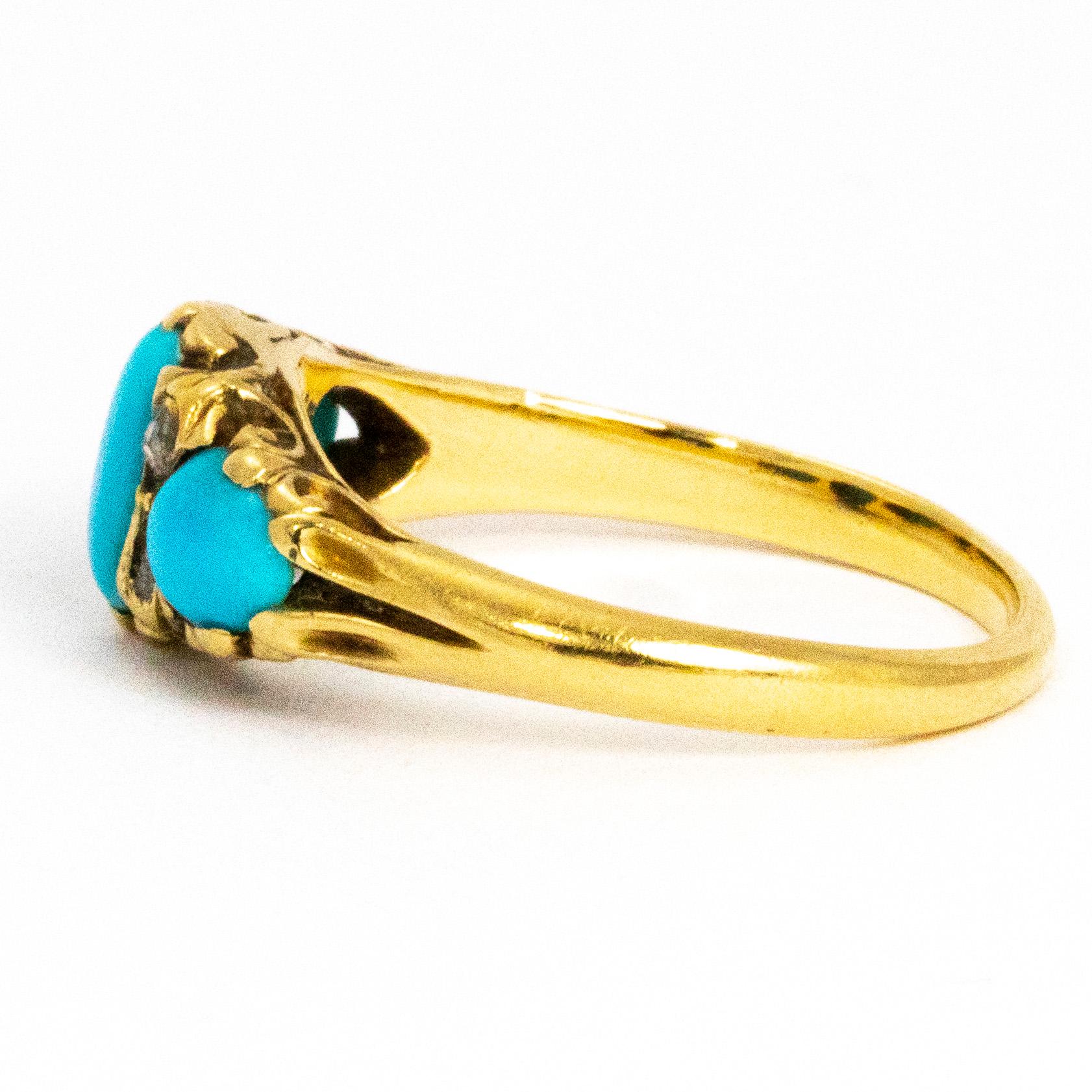 The pop of these bright turquoise stones next to the 18 carat gold is beautiful. The rose cut diamonds that sit in pairs between them add just the right amount of sparkle. The ring is modelled in 18ct gold. The centre stone measures 6.8mm x 4mm.