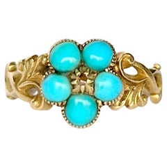 Bague médaillon victorienne en or 9 carats sertie d'une turquoise et d'un diamant taille rose