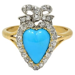 Anello vittoriano con turchese cabochon e diamante in oro giallo 18 carati con arco a cuore antico