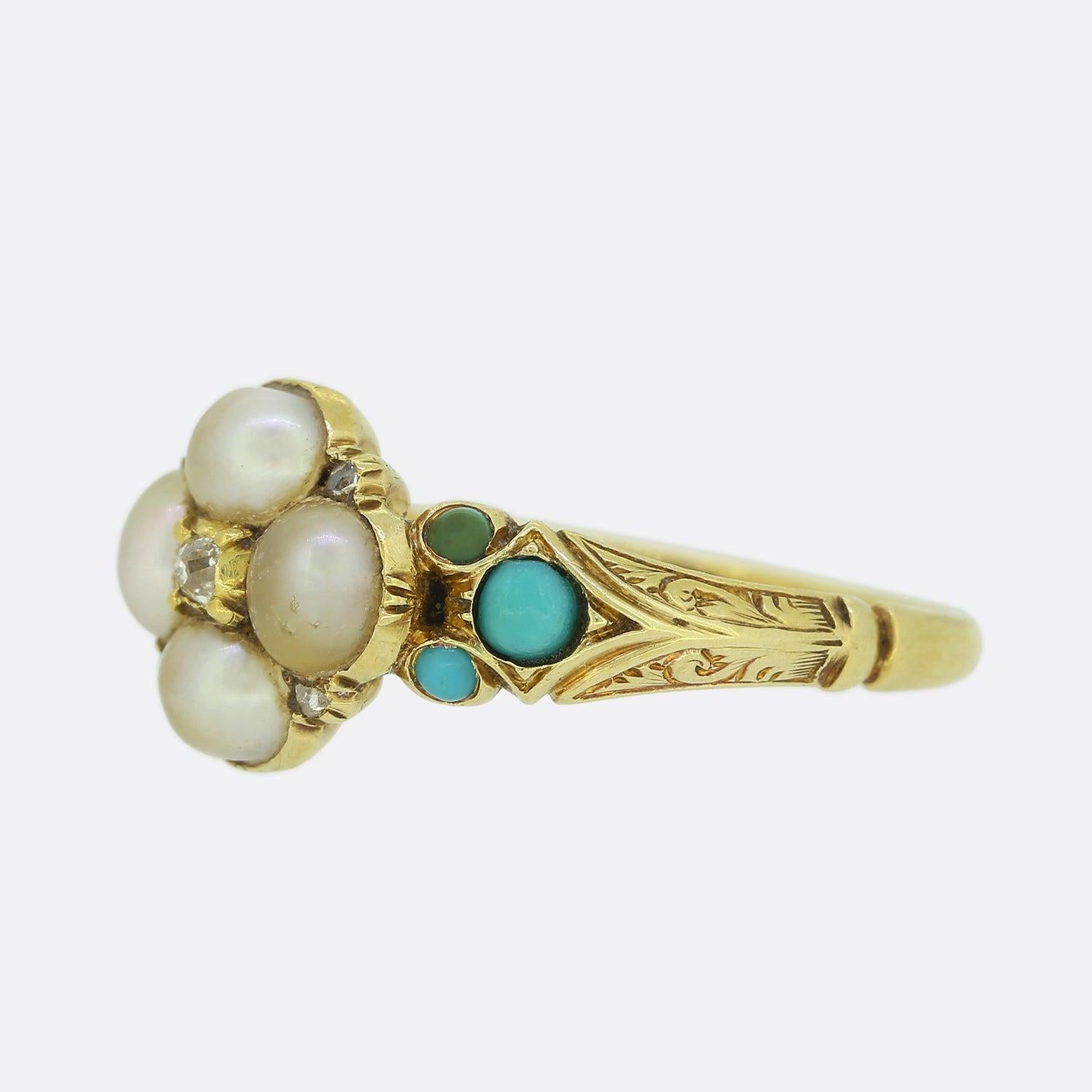 This is a Victorian turquoise, diamond and pearl cluster ring from the Victorian era. The ring features a central old cut diamond surrounded by four natural pearls and four rose cut diamonds. The ring also features three turquoise stones set on each