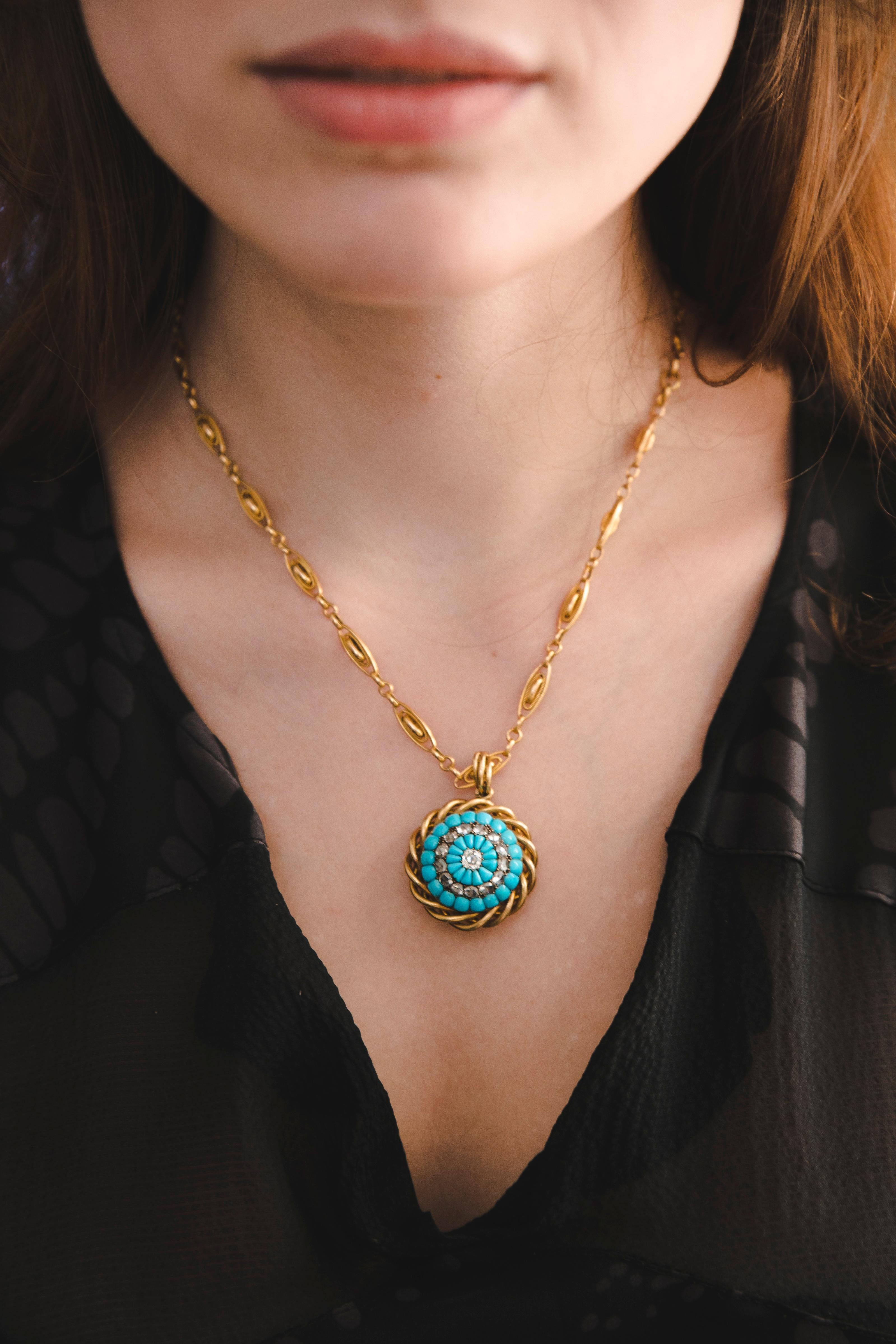 Turquoise & Diamonds Golden Pendant on a Chain. Victorian 1900. 
On the flip side, there is a special compartment for a note, a miniature portrait or for a curl of the loved ones. The Turquoise is a really bright colour, the Diamonds are fine, clean