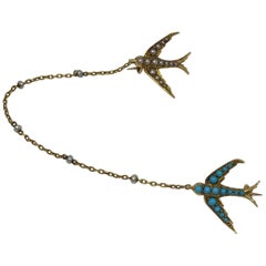 Victorian Turquoise Pearl and 15 Karat Swallow Brooch