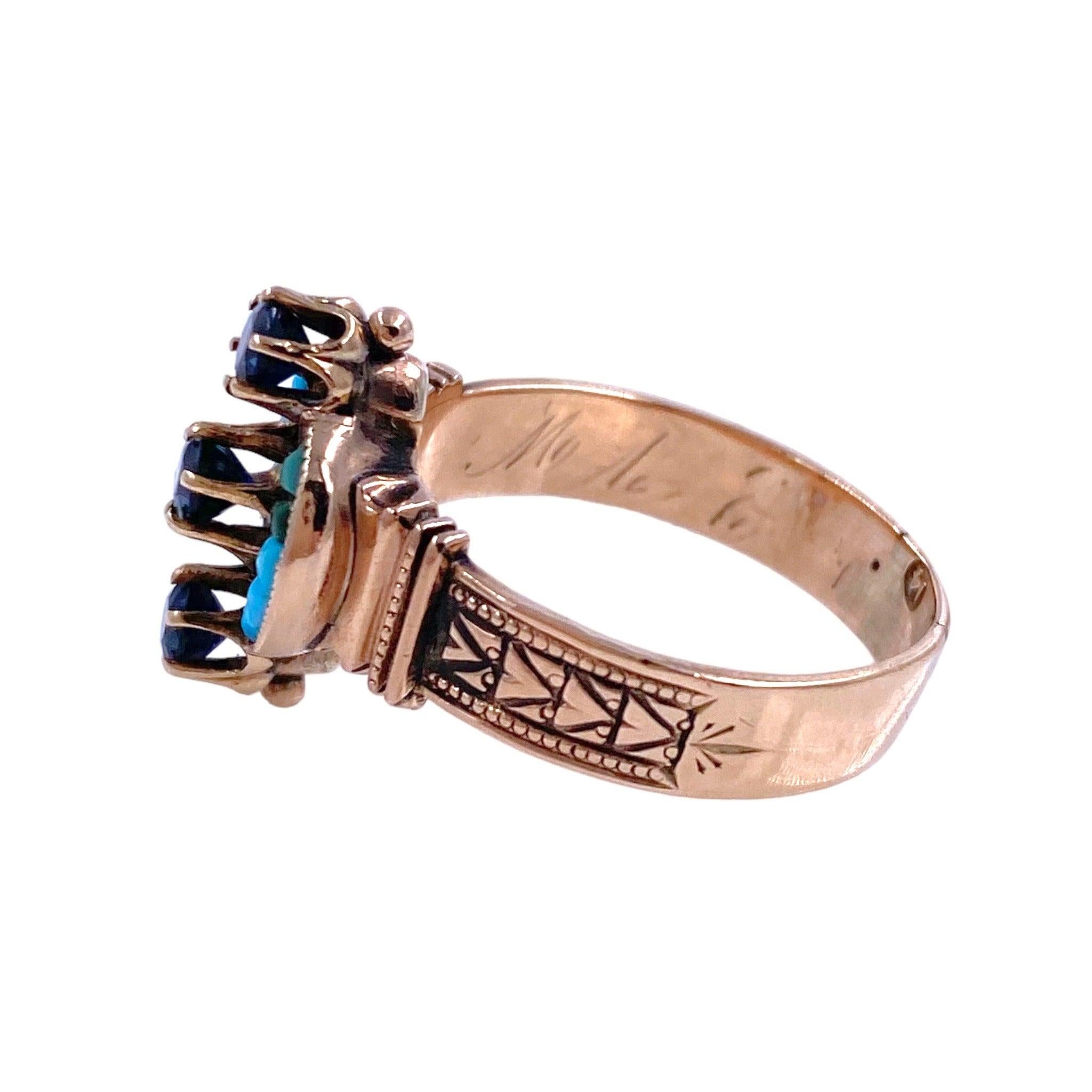 14K rose gold Victorian ring believed to be American made circa 1890's. The ring features three prong set round sapphires and calibre cut, slightly mismatched color turquoise. The shoulders are hand engraved. Part of the original date and message