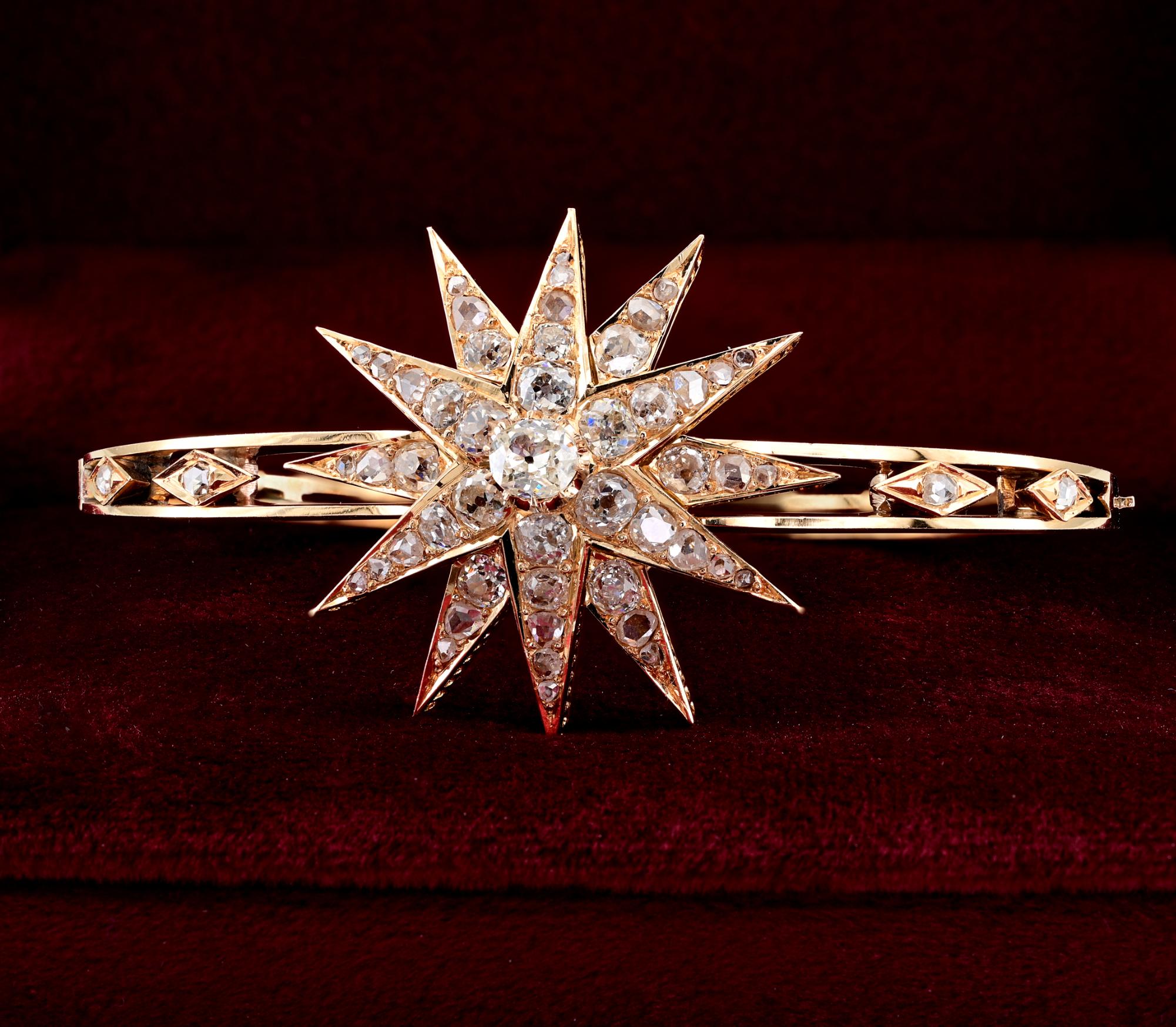 This outstanding Victorian bangle is 1880 ca.
Superbly hand crafted during the time of solid 18 KT gold
Displaying superlative past workmanship, modelled with a large front side twelve rayed upfront with rich Diamond set and  shoulders decorated
