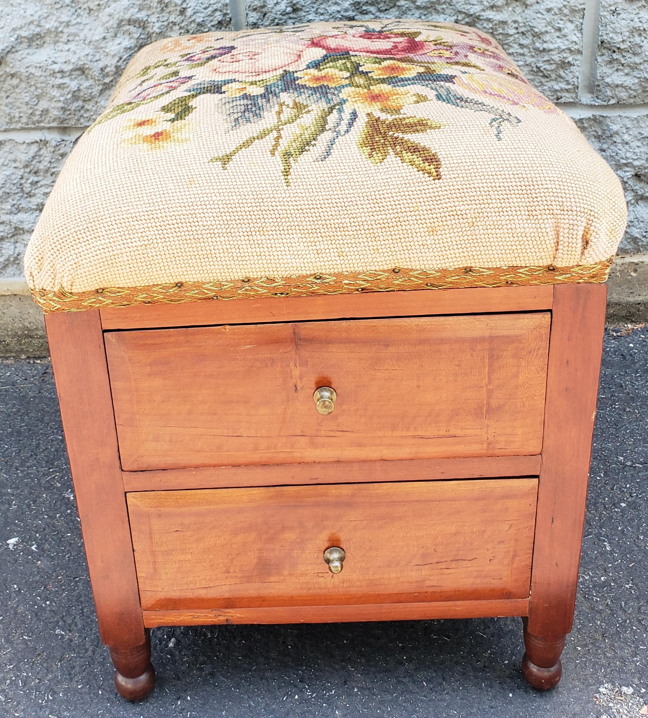 A rare Victorian Two-Drawer Mahogany Needlework Upholstered Stool on wheels. 
Recently refinished. Both drawers working well. On original wheels.
Measures 15