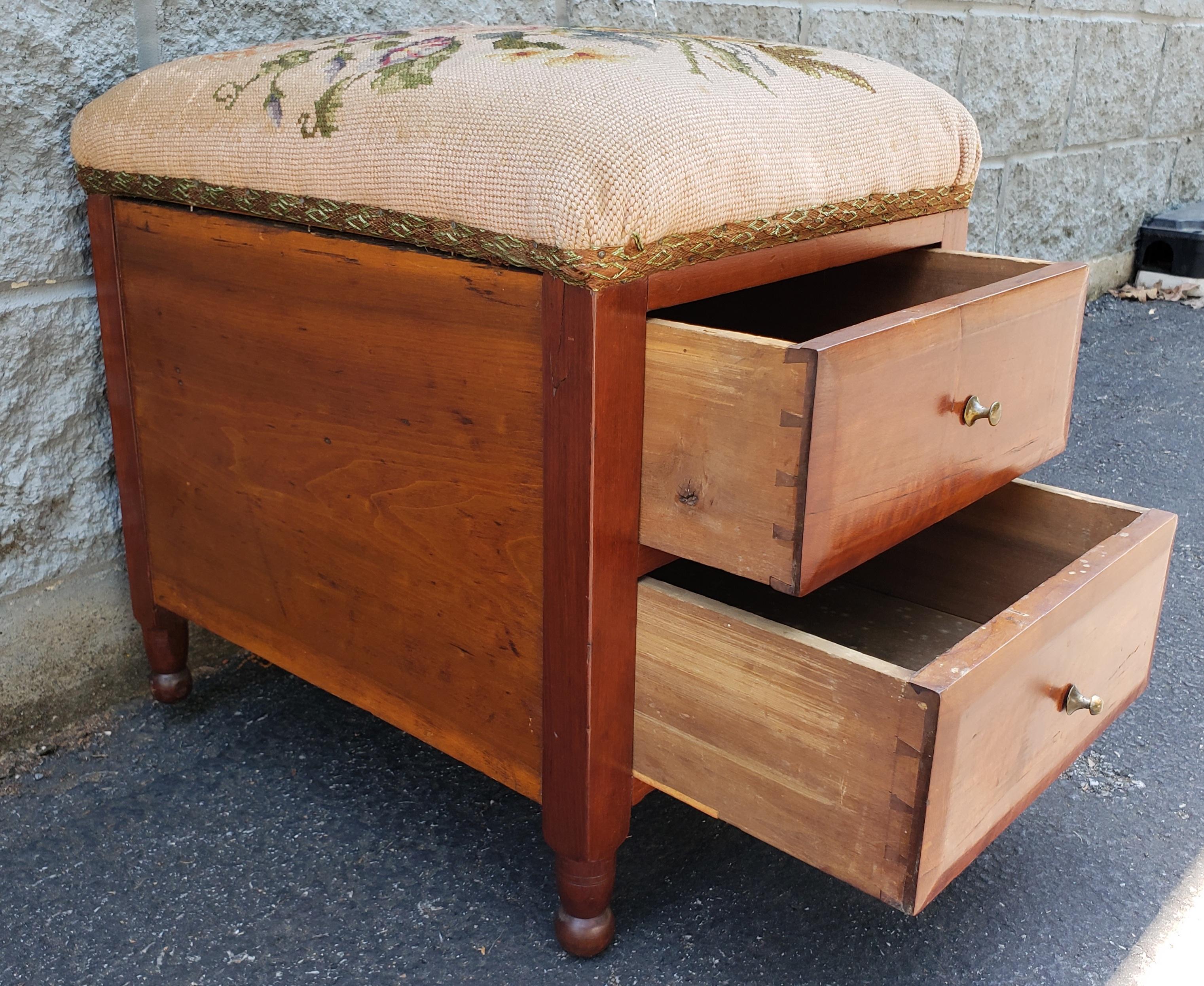 Stained Victorian Two-Drawer Mahogany Needlework Upholstered Stool on Wheels For Sale