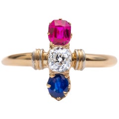 Circa 1881 Victorian Diamond, Ruby, Sapphire Ring in Platinum and 18 Karat Gold