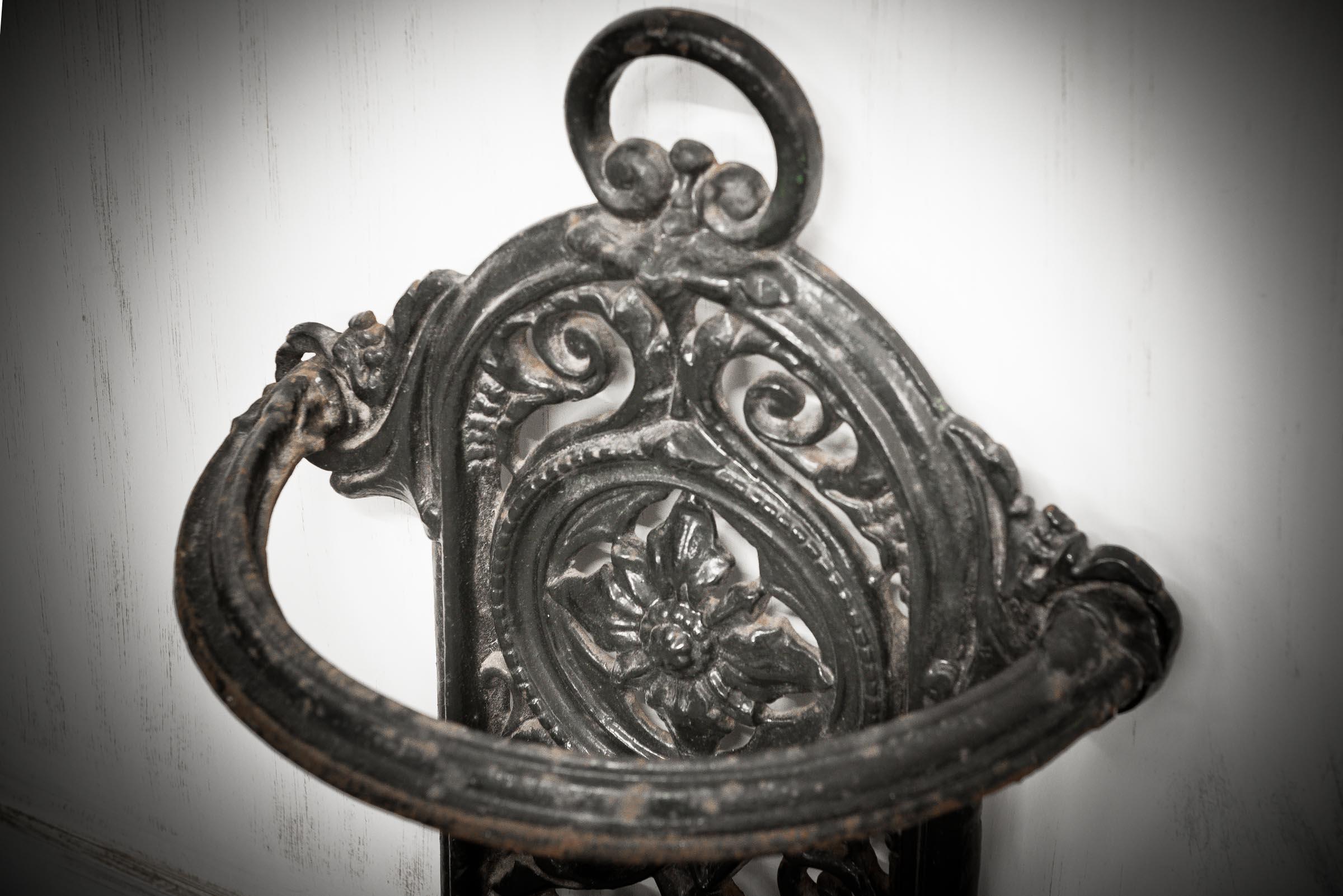 Beautiful umbrella stand made from cast iron which is typical of the Victorian era. The stand is finished with swirled designs leading down to a half crescent drip tray.