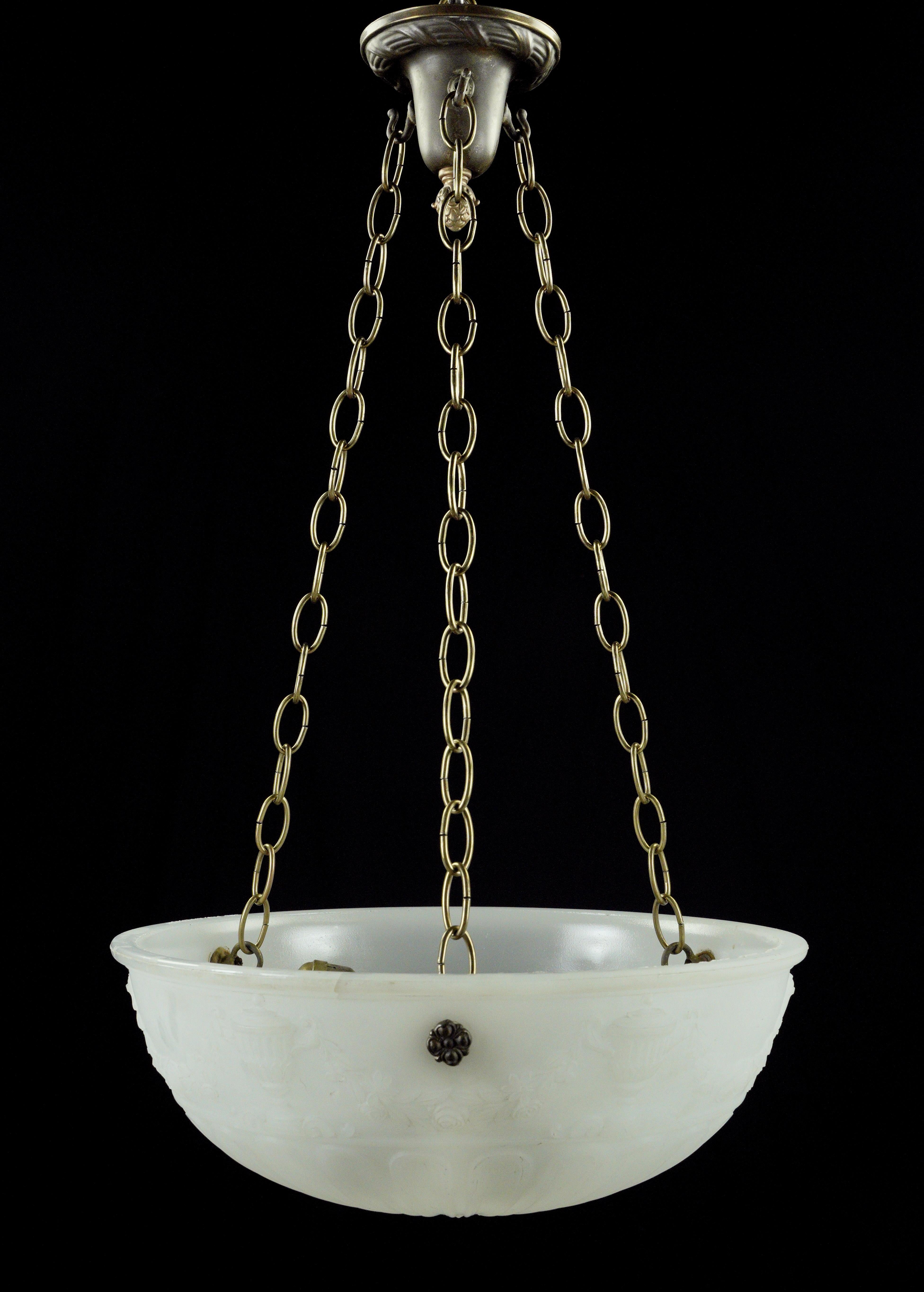 White cast glass Victorian bowl pendant light with ornate floral, foliate and urn designs with a steel chain. This requires three standard medium base bulbs. Stamped 6116 on the bowl rim. Good condition with appropriate wear from age. Cleaned and