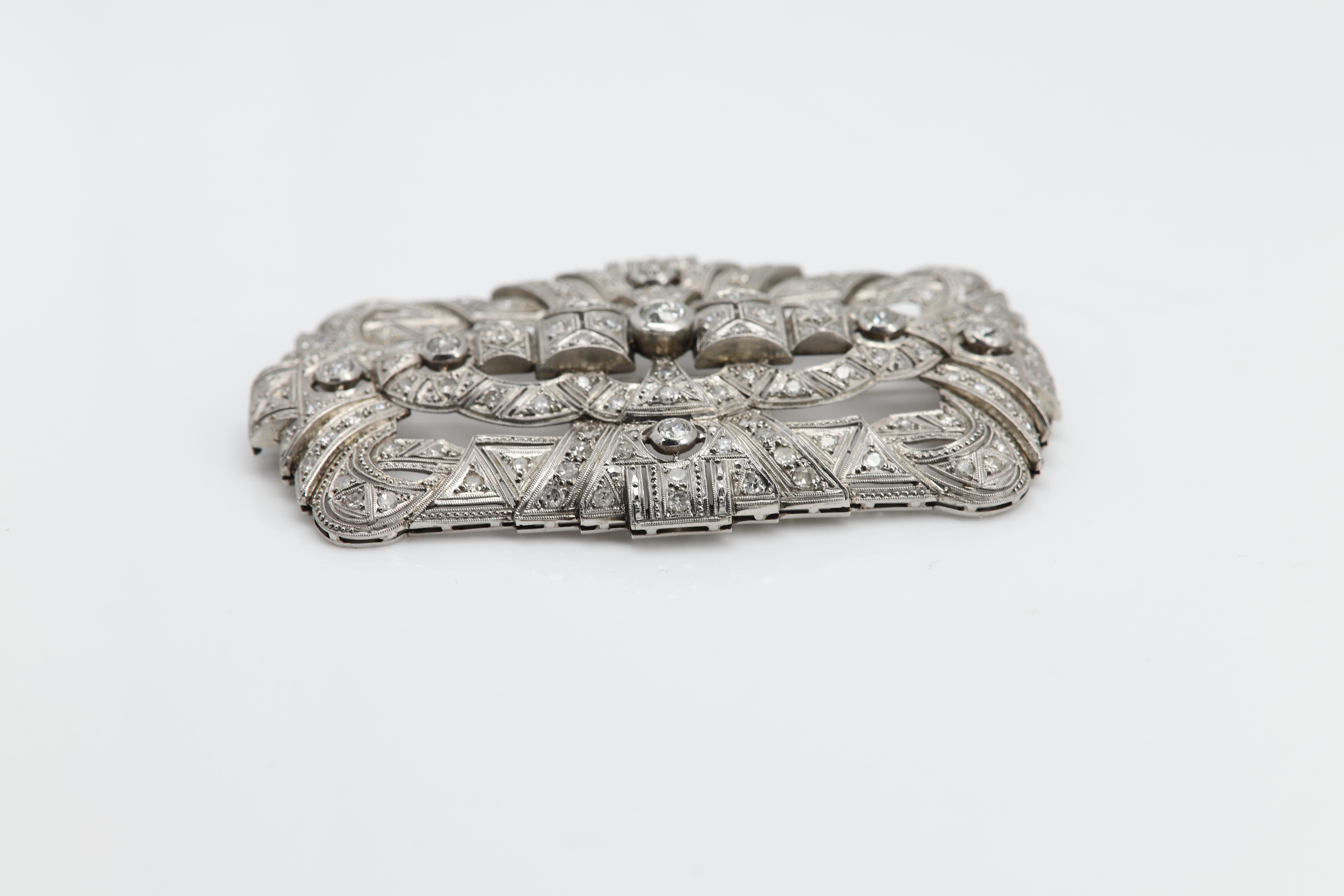 Vintage art deco Brooch pin 
Platinum approx 32 grams
Natural Diamonds approx 5.0 carat 
mix sizes and qualities, center stone is 5.0mm, six others are 4.0mm the rest is approx 2.0 mm stones
mix diamonds qualities about I-H-G-SI some are old cut and