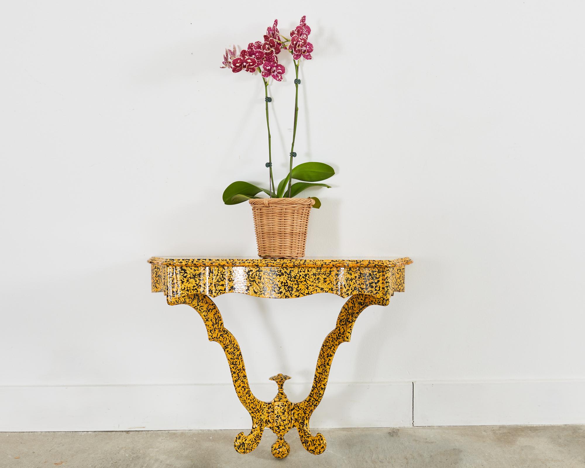 Whimsical late 19th century English Victorian wall mounted console table or shelf crafted from solid mahogany. The shelf features a modern redux by artist Ira Yeager (American 1938-2022). The console has been lacquered in black and painstakingly