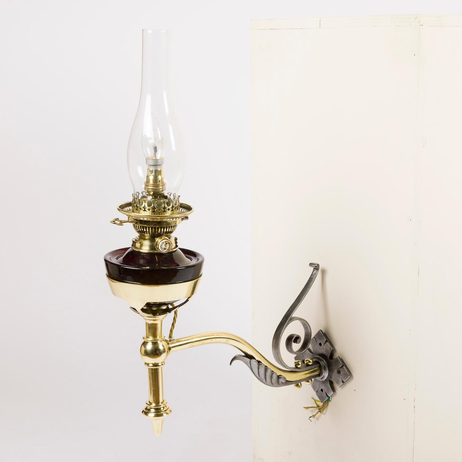 English Victorian wall mounted oil lamp, converted to electricity. For Sale