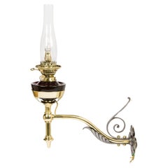 Antique Victorian wall mounted oil lamp, converted to electricity.