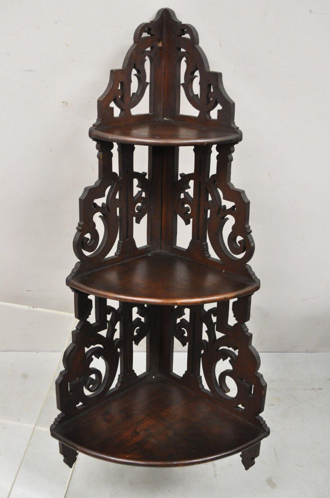 Antique Victorian Walnut 3 Tier Carved Knick Knack Corner Whatnot wall shelf Curio. Circa Early 20th Century. Measurements: 38