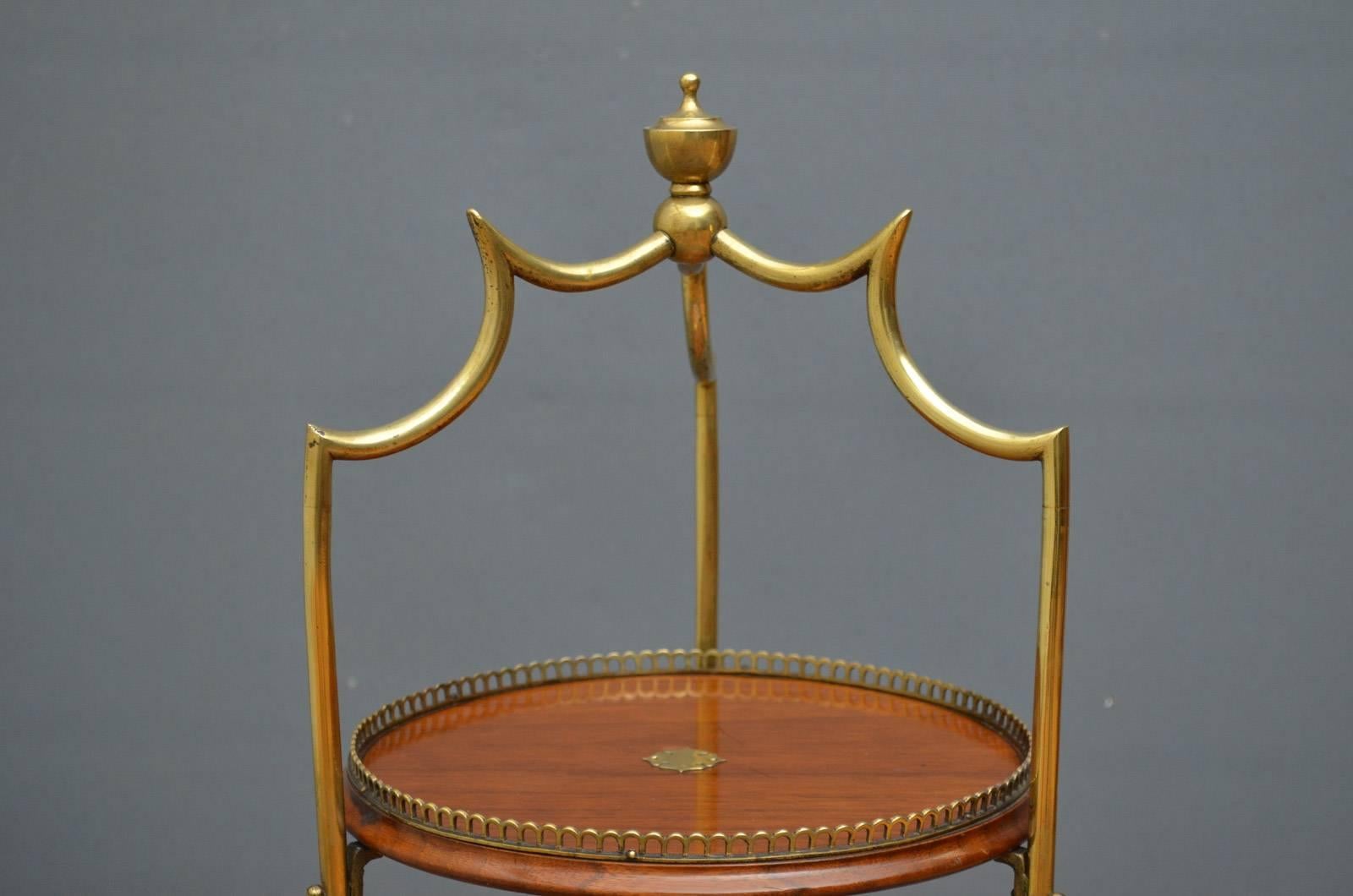 Sn4331, stylish Victorian cake stand with three walnut tiers each with brass gallery and three brass supports, all in excellent original condition, circa 1880
Measure: Height 34