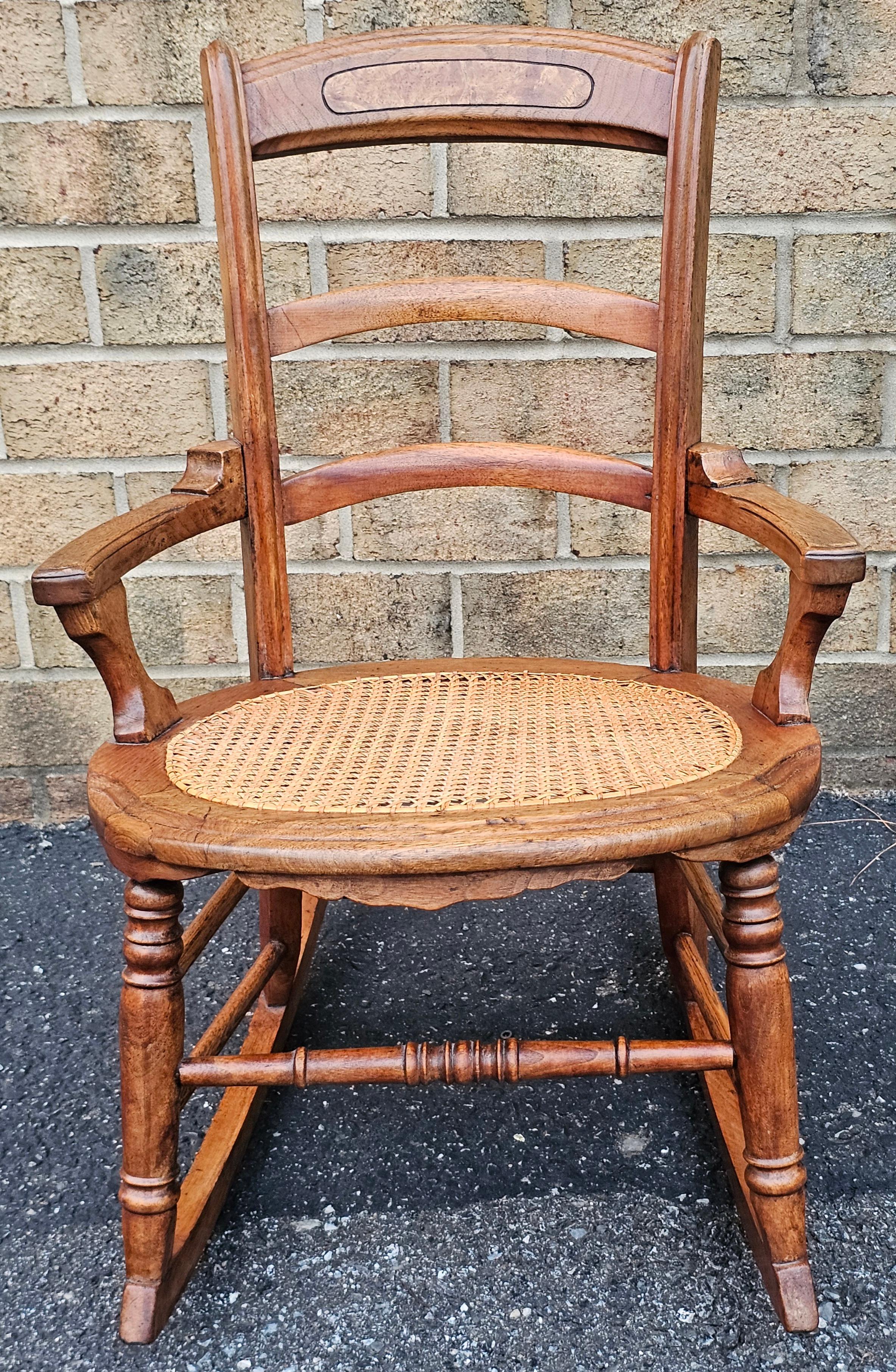 American Victorian Walnut and Cane Seat Rocker For Sale