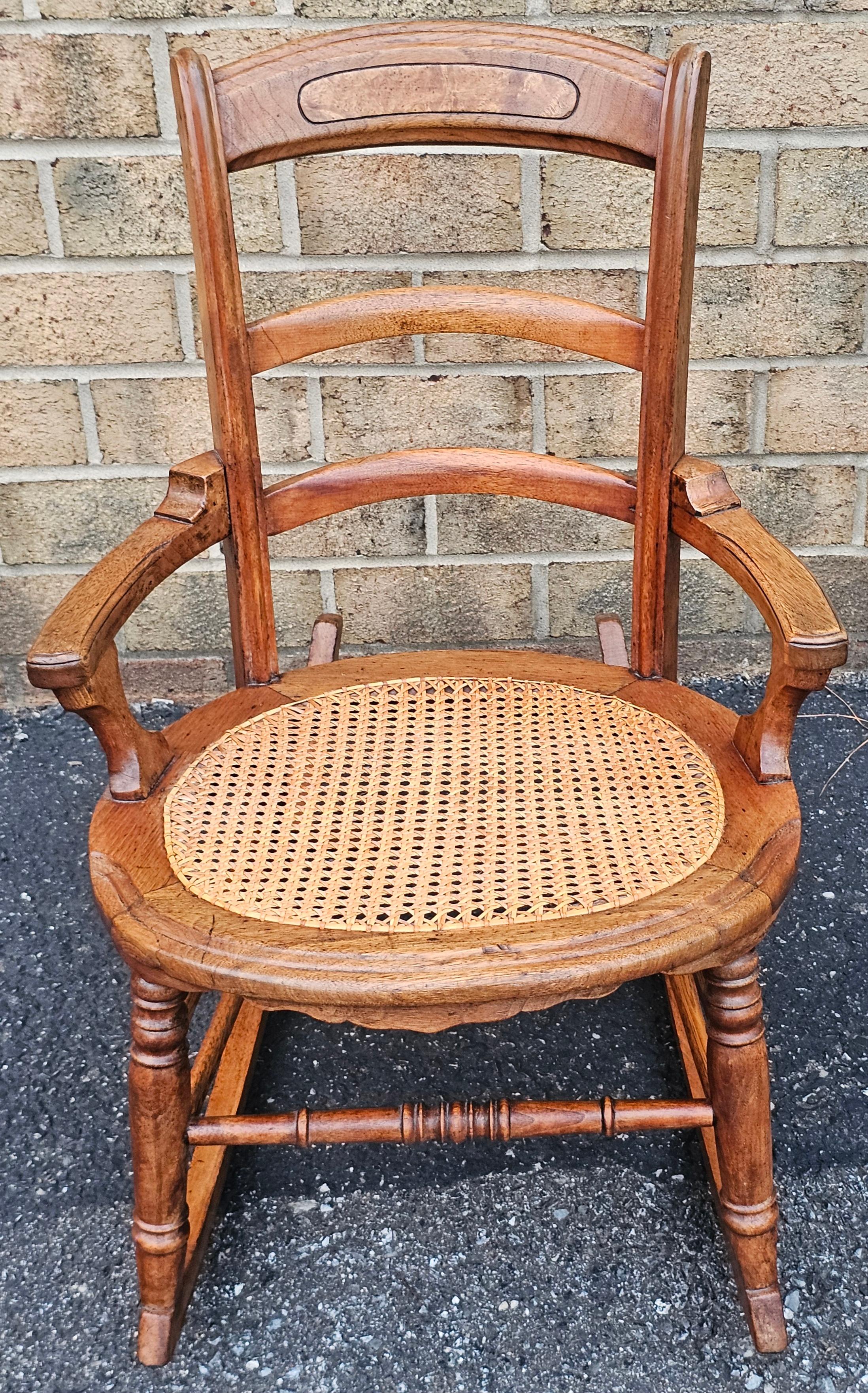 Stained Victorian Walnut and Cane Seat Rocker For Sale