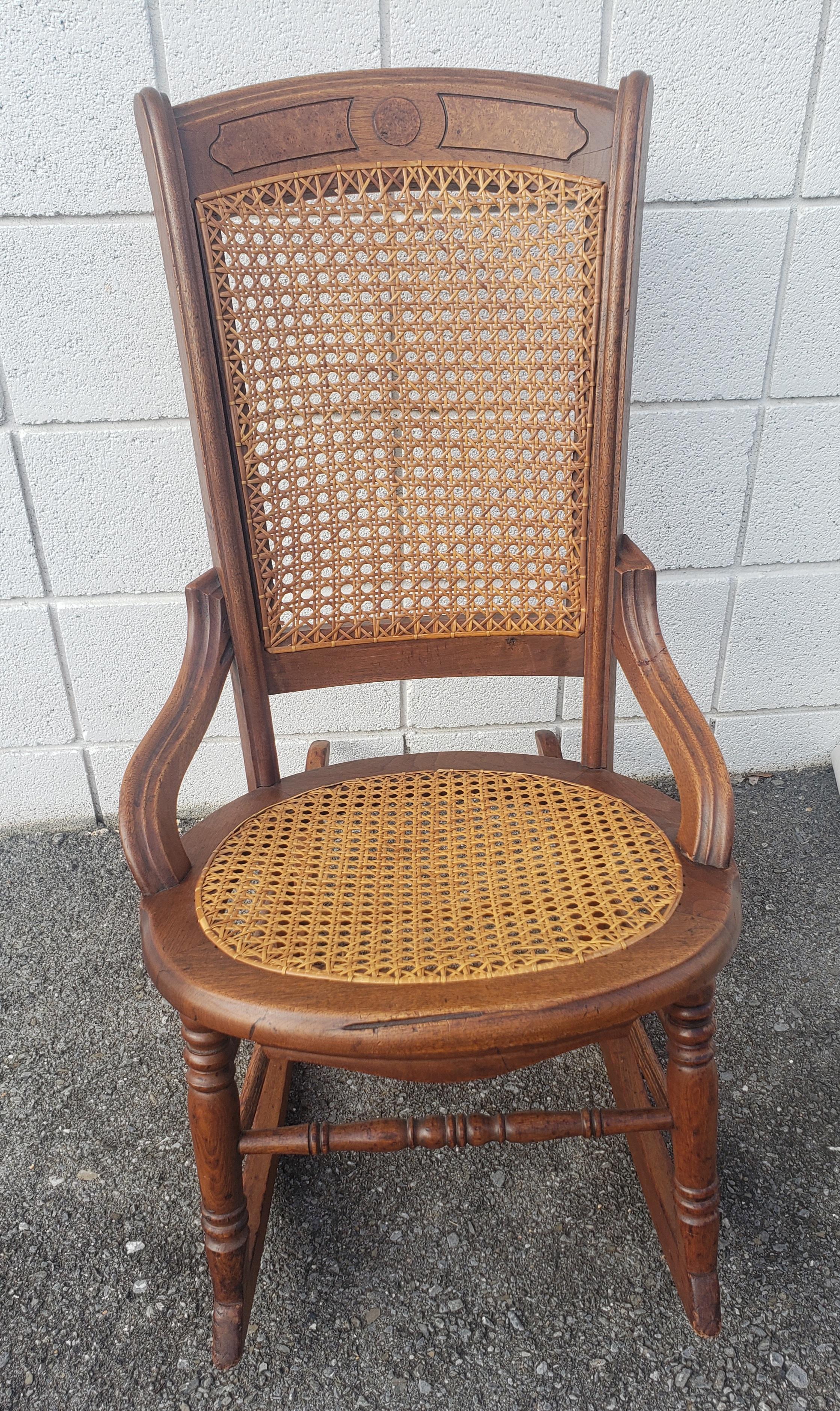 American Victorian Walnut and Cane Seat Rocking Chair For Sale
