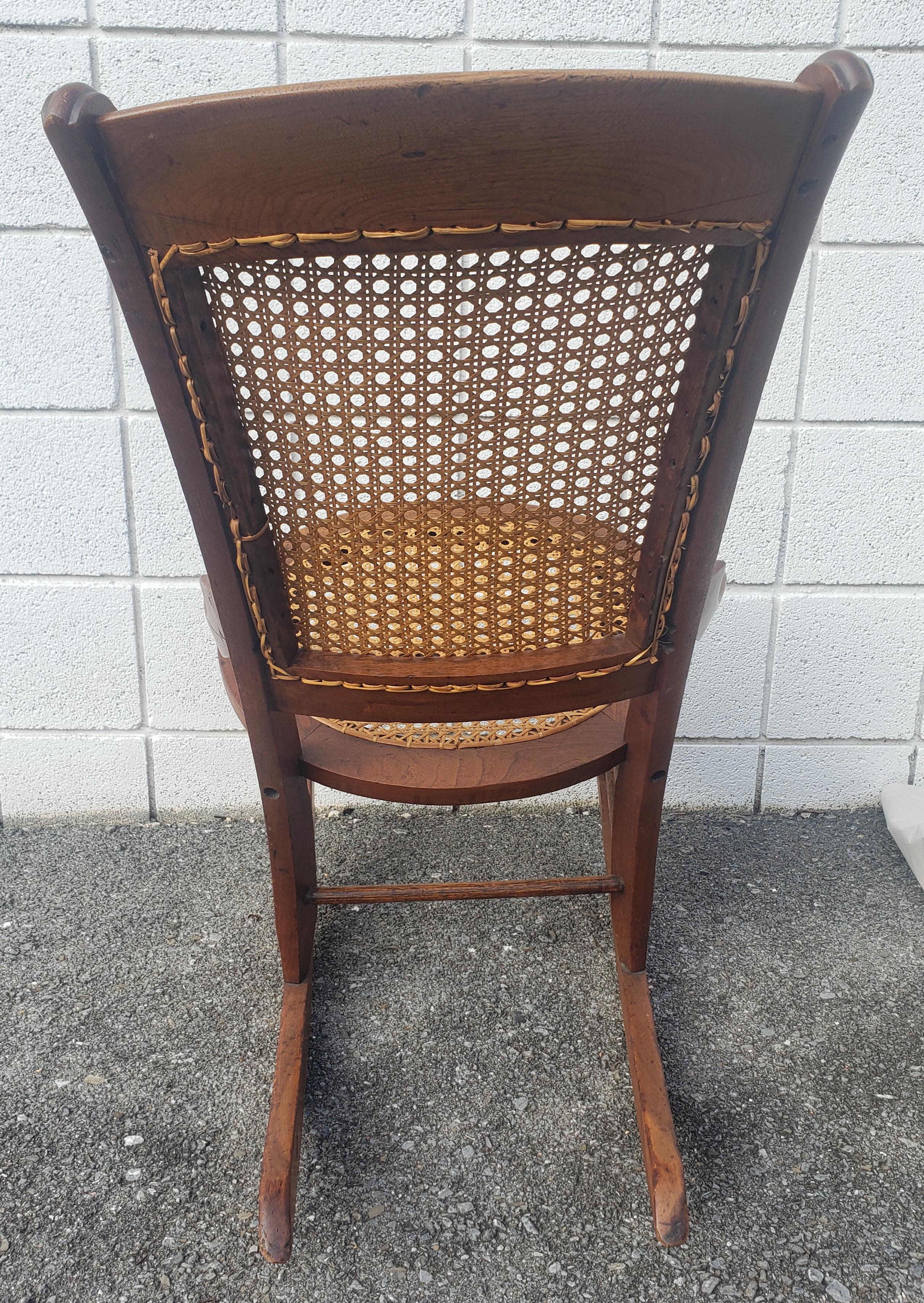 Victorian Walnut and Cane Seat Rocking Chair In Good Condition For Sale In Germantown, MD