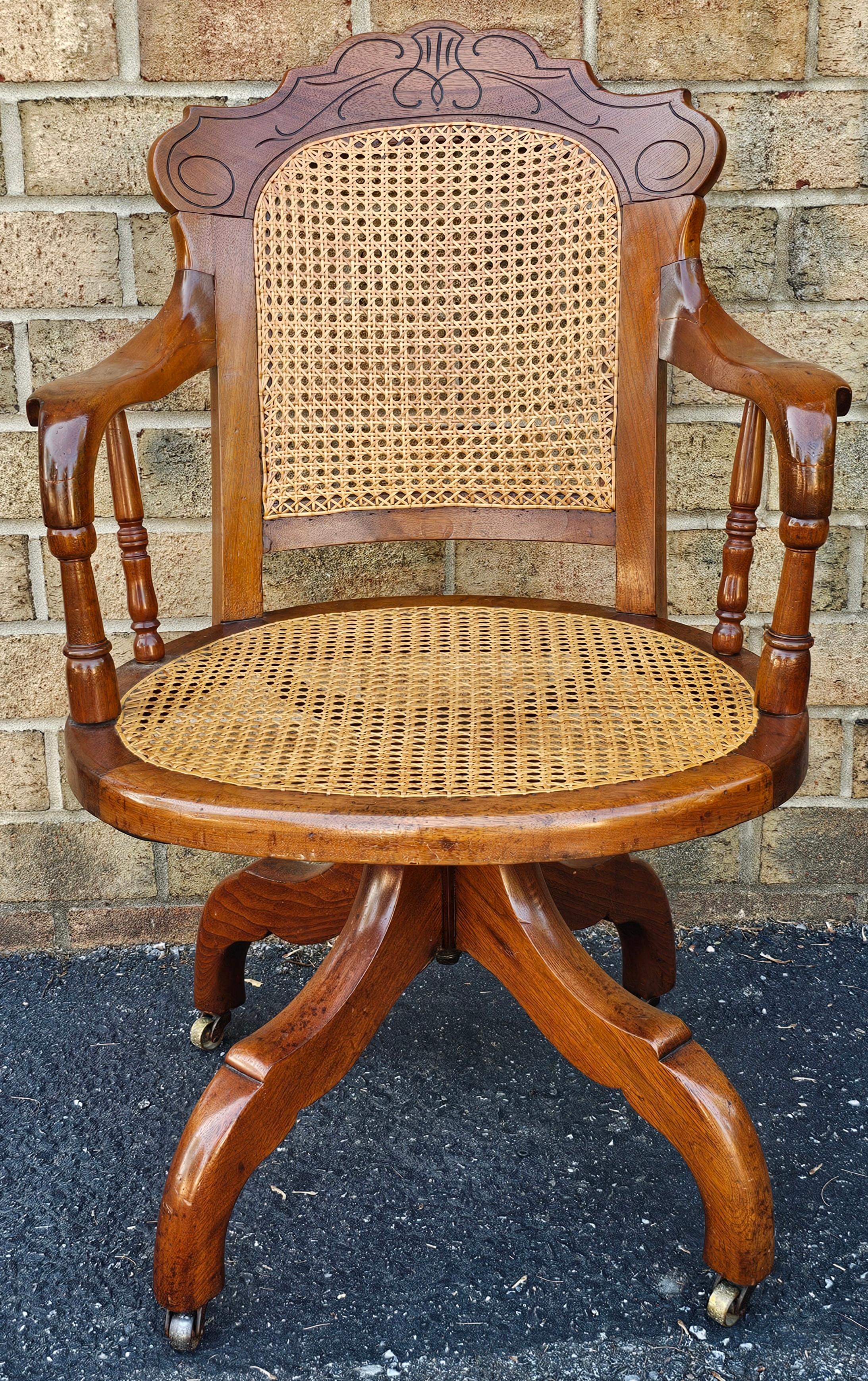 Victorian Walnut and Caned Seat and Back Rolling Office Chair In Good Condition For Sale In Germantown, MD