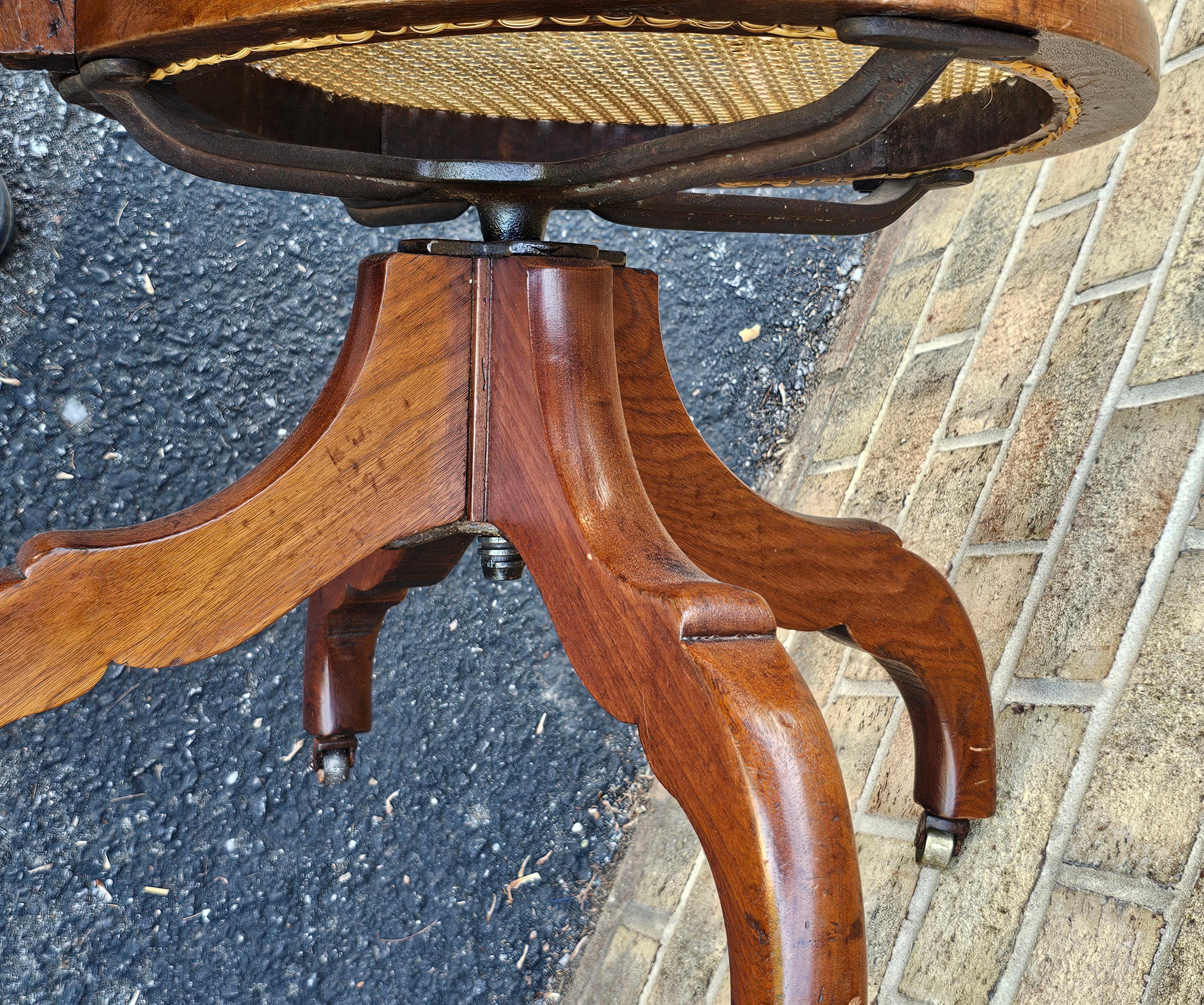 Victorian Walnut and Caned Seat and Back Rolling Office Chair For Sale 1