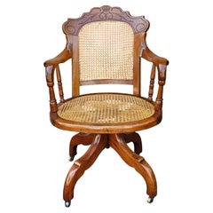 Victorian Walnut and Caned Seat and Back Rolling Office Chair