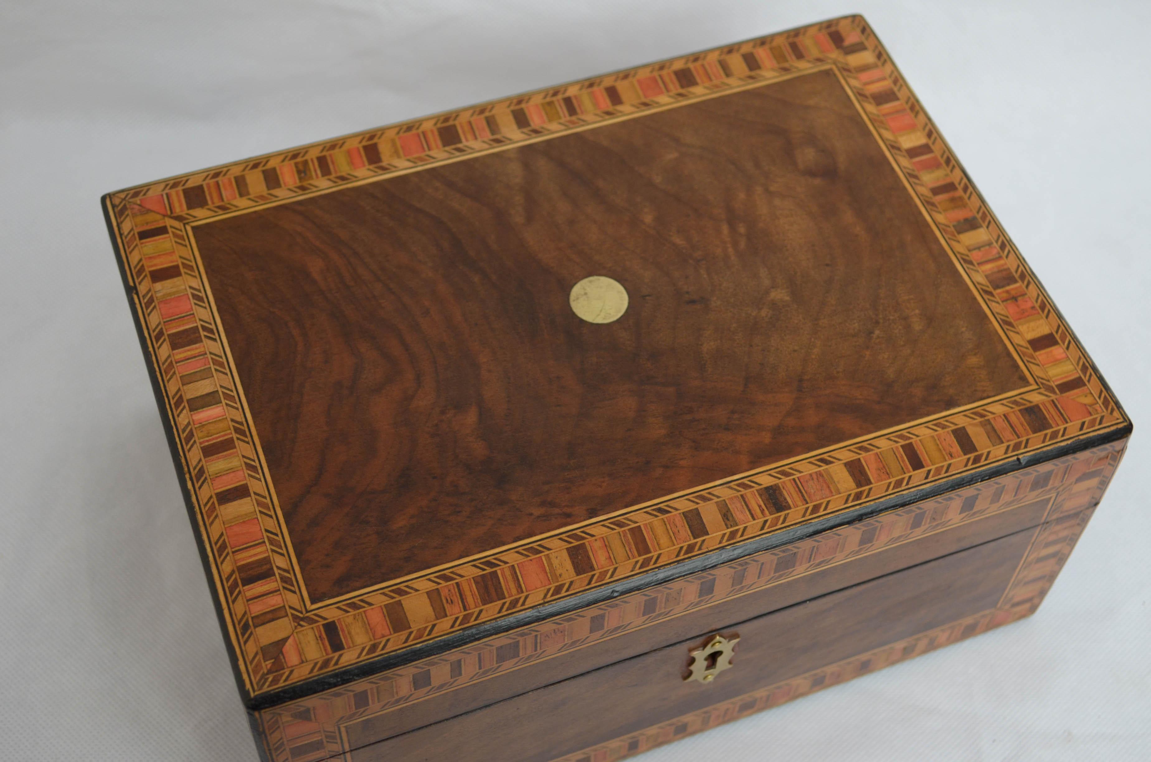 K0479 Very attractive Victorian figured walnut jewelry box, having Tunbridge ware inlaid to the front and hinged lid which opens to reveal newly lined interior with lift up tray. This antique box has been sympathetically restored and is in home