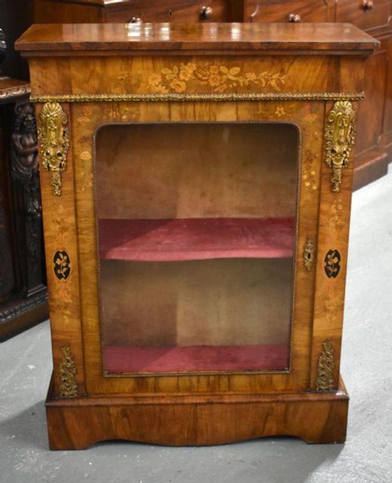 For sale is a good quality Victorian burr walnut and marquetry inlaid pier cabinet, in good condition for its age, showing minor signs of wear commensurate with age and use.

Width: 32.5