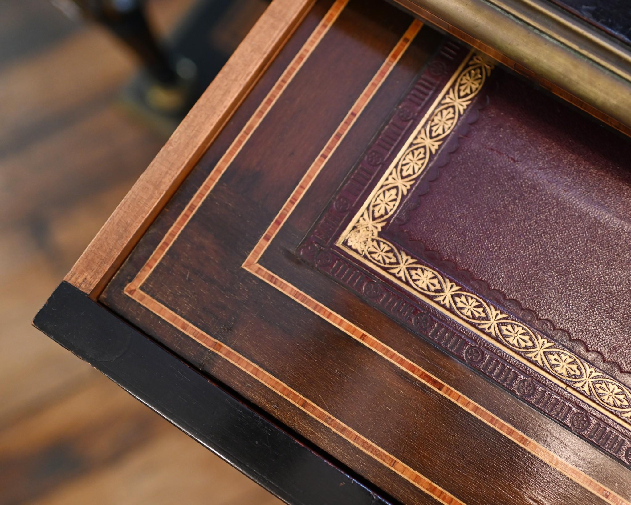 Stunning Victorian Bonheur du Jour desk we date to circa 1880
Lovingly crafted from burr walnut with ebony details for effect
Ormolu fixtures are original which surround the hand painted
Sevres plaque portrait plates
Solid construction and offered