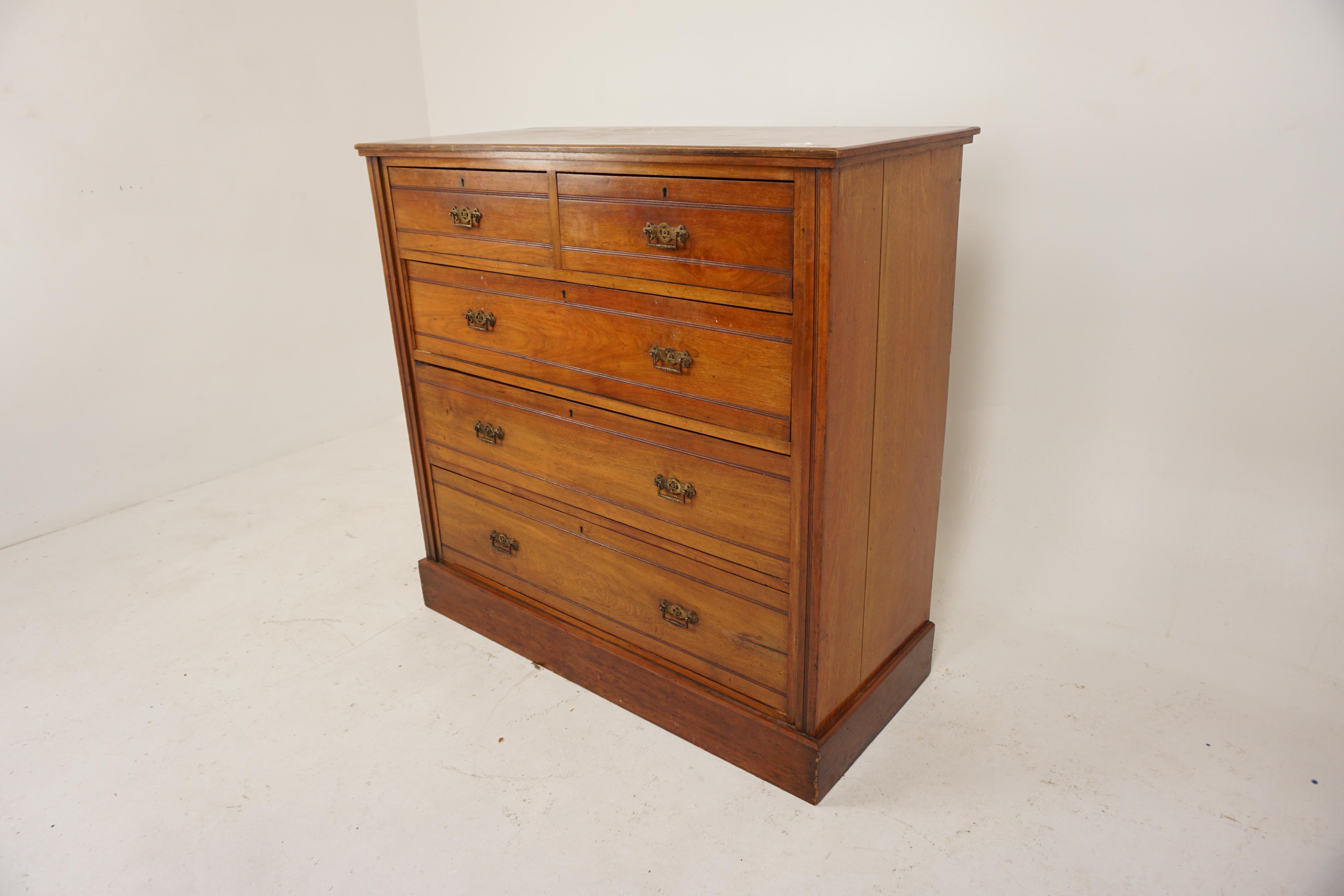 Victorian Walnut Chest of Drawers, Dresser, Scotland 1890, H683

Scotland 1890
Solid Walnut
Original finish
Rectangular moulded top
Two short drawers over three long drawers
All original brass pulls and brass escutcheons
It stands on a plinth