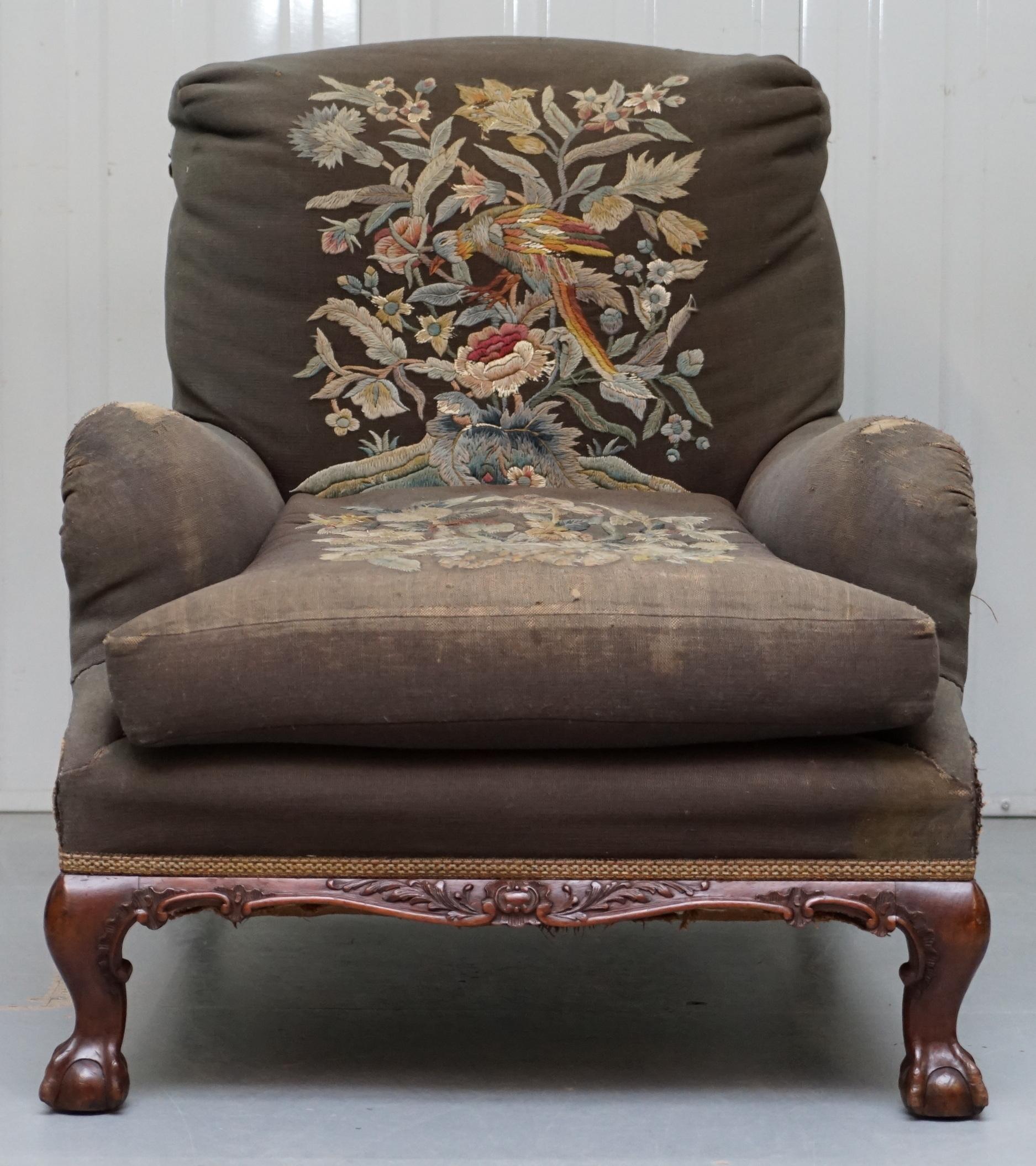 We are delighted to offer for sale this stunning exceptionally rare original Victorian walnut framed Claw & Ball feet Howard & Son’s Berners Street stamped Grafton model long platform armchair with original Embroidered upholstery 

This chair is