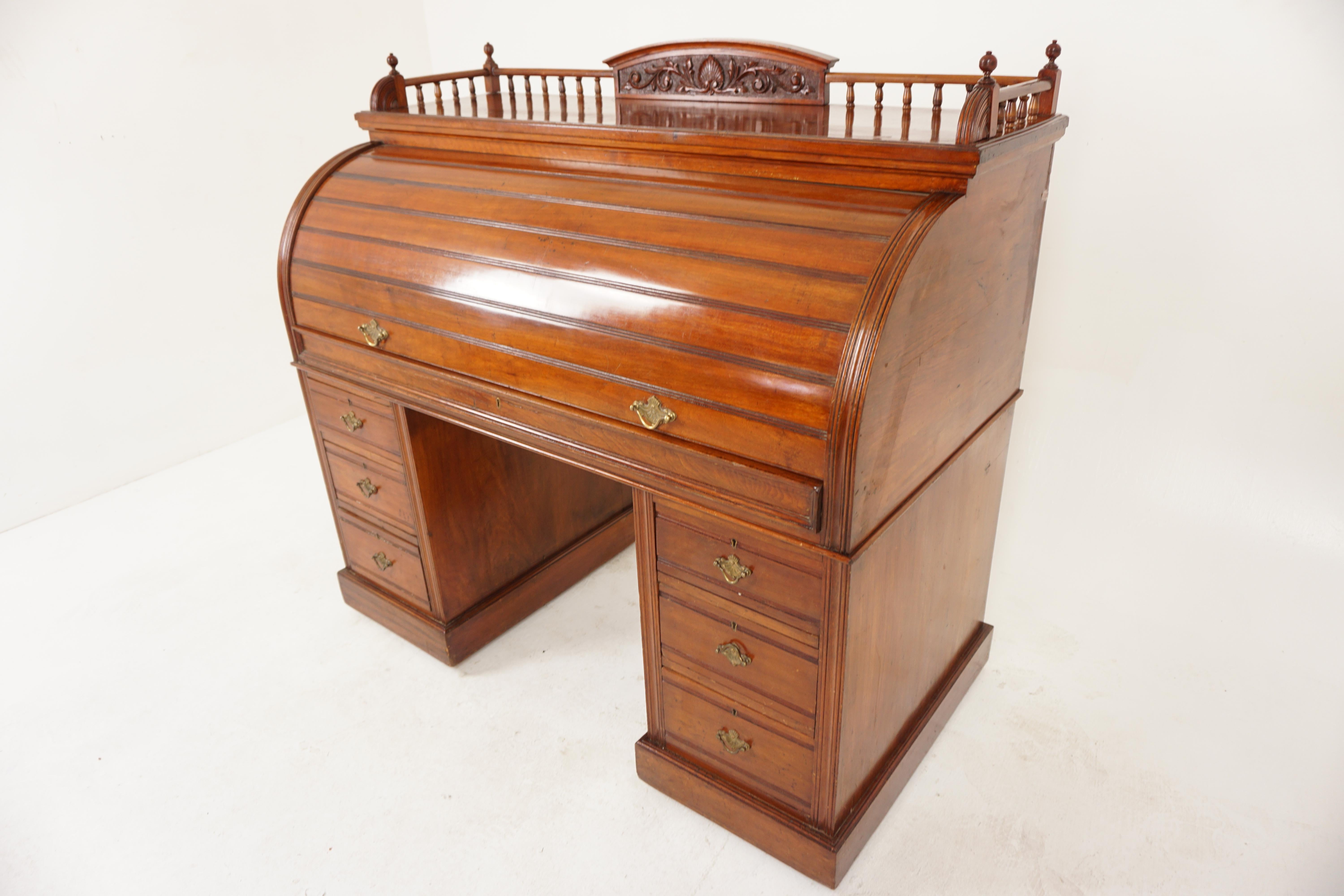 Victorian Walnut Cylinder Desk, Roll Top, Pedestals, Scotland 1890, H1176

Scotland 1890
Solid Walnut
Original Finish
Three quarter carved gallery on top
The cylinder (lockable with key provided) rolls back to reveal a pull out fitted interior
with